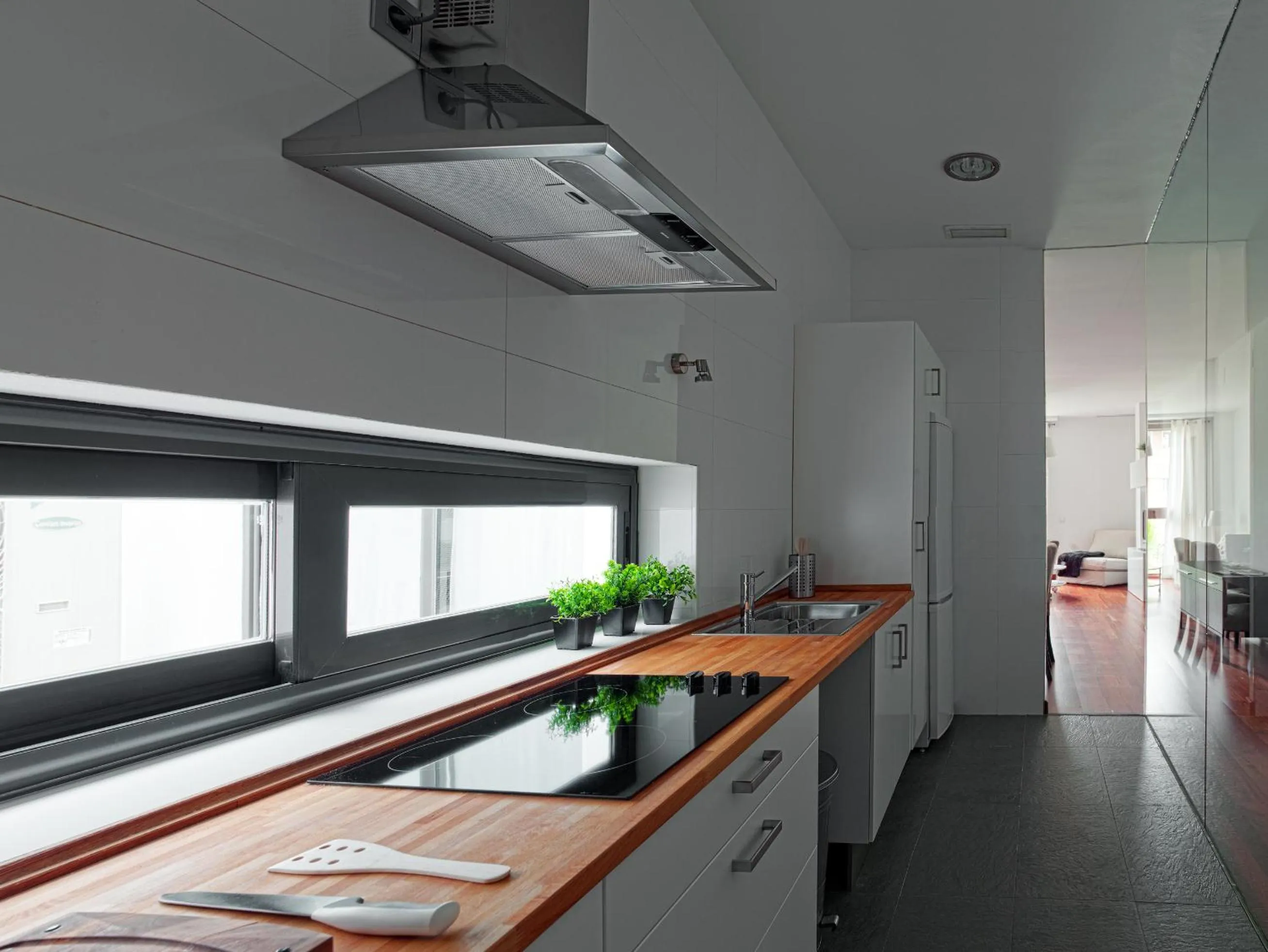 Kitchen or kitchenette in AZZ Sevilla Torre de la Plata Apartamentos