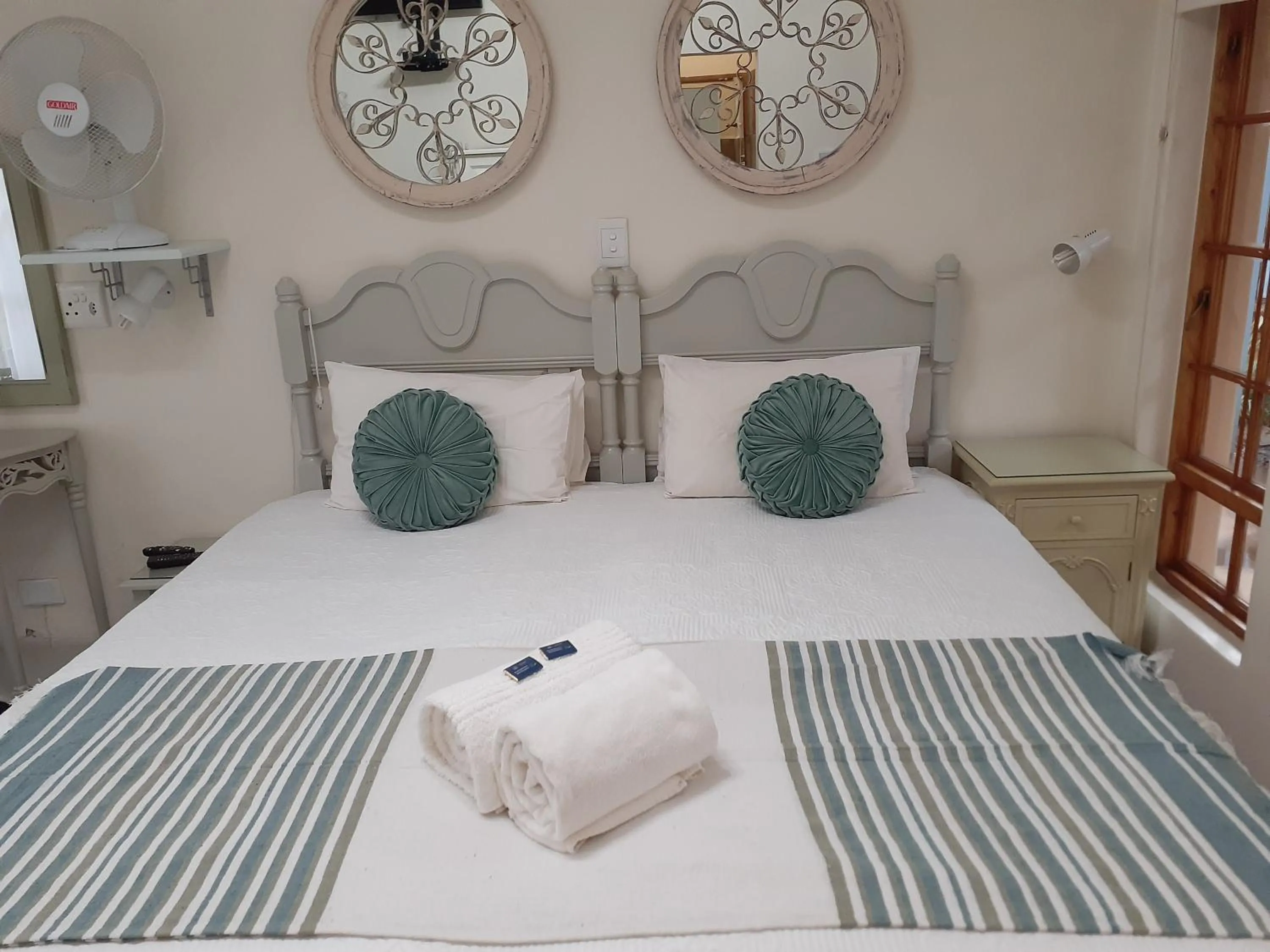 Bed in Sandstone Chameleon Guest House