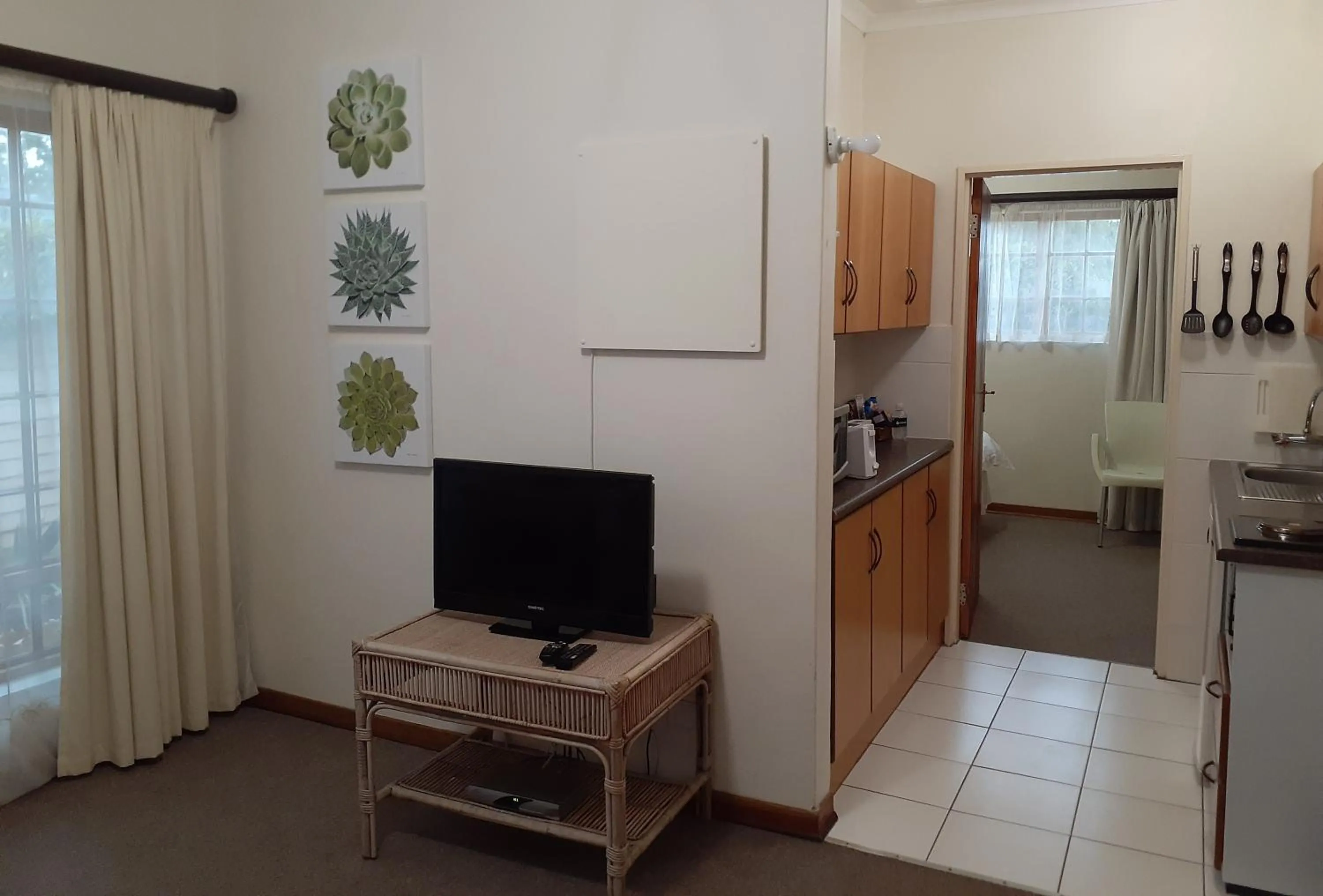 Living room in Sandstone Chameleon Guest House