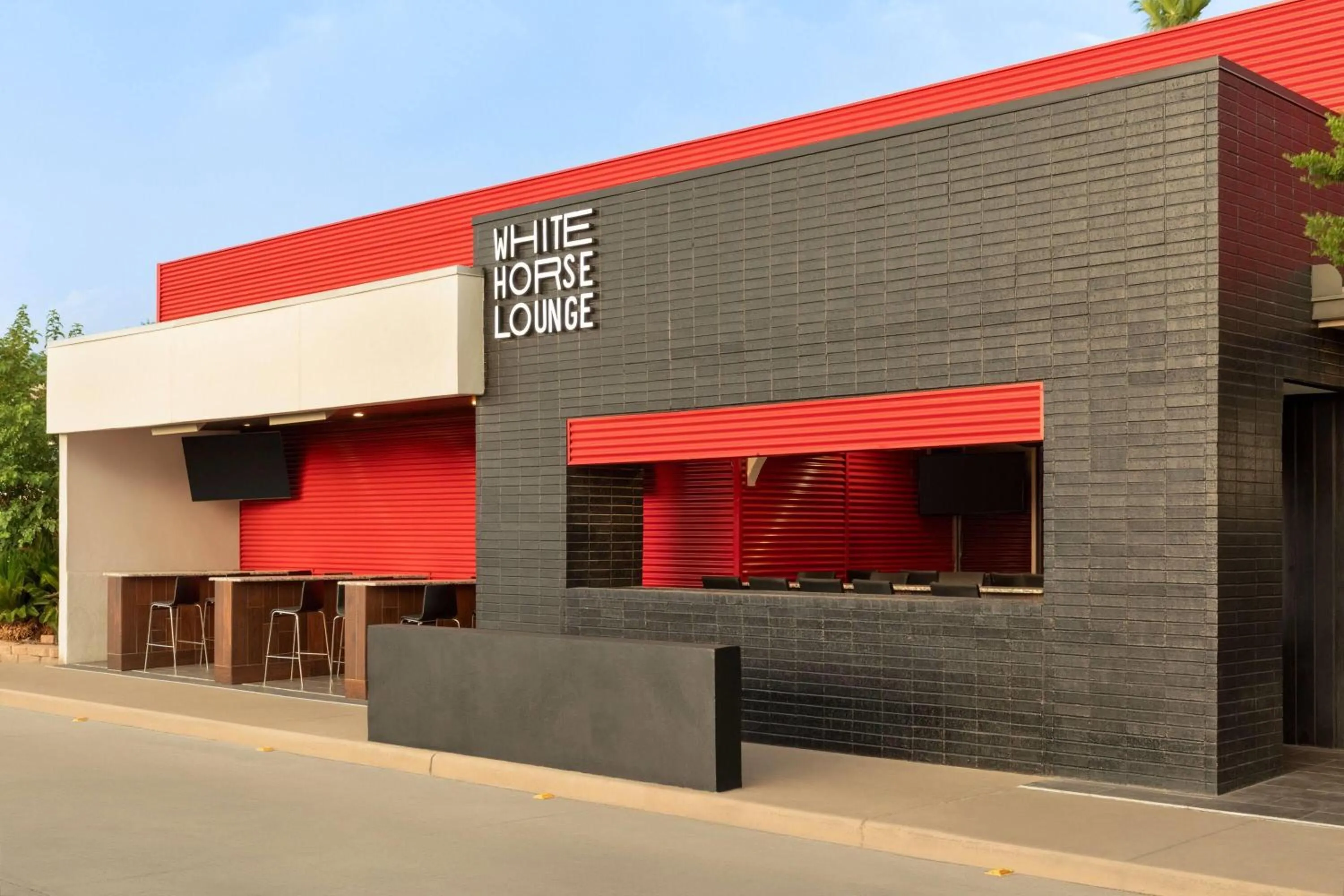 Lounge or bar in Ramada by Wyndham Del Rio