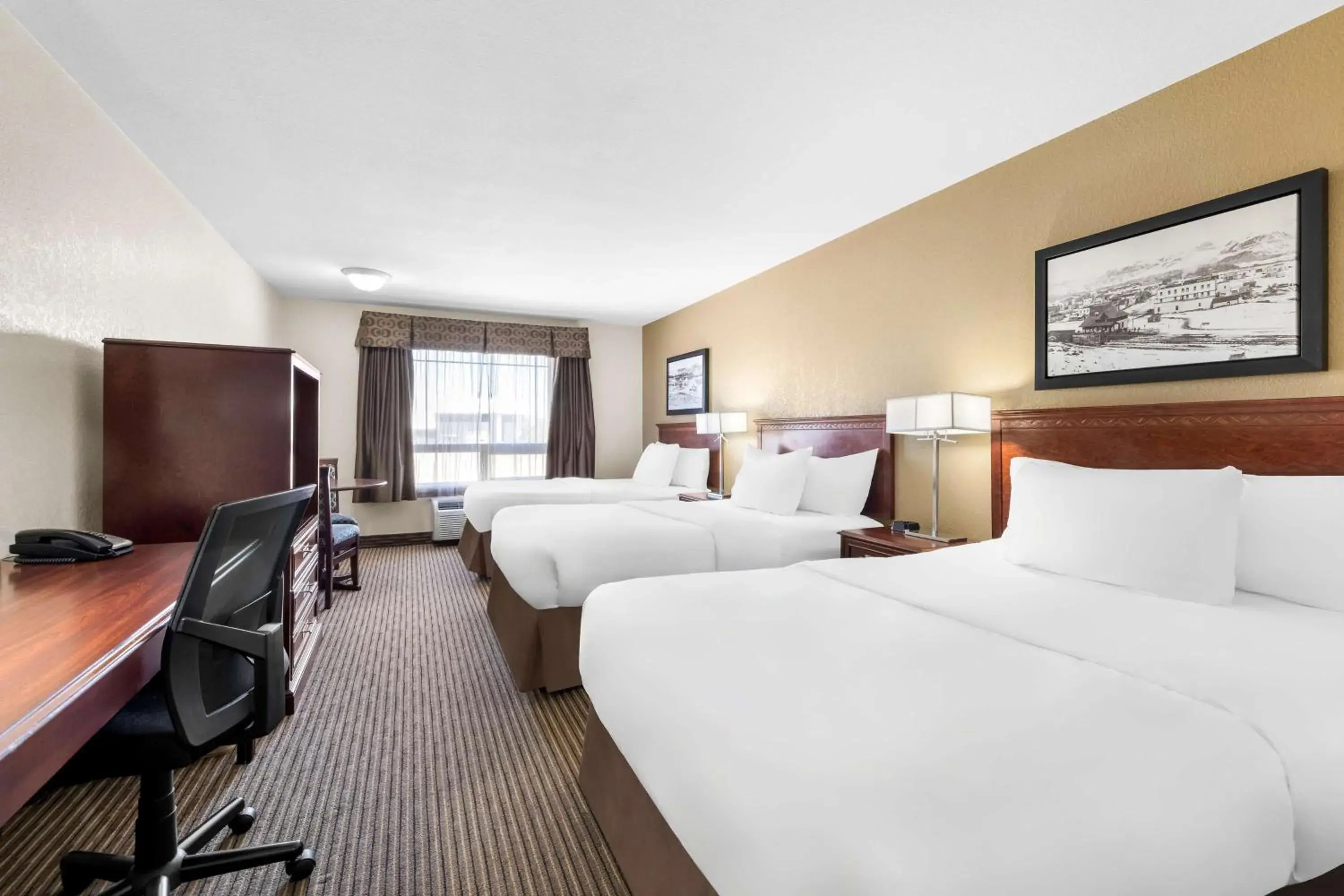 Bedroom, Bed in SureStay Plus Hotel by Best Western Drumheller Bedroom, Bed in SureStay Plus Hotel by Best Western Drumheller