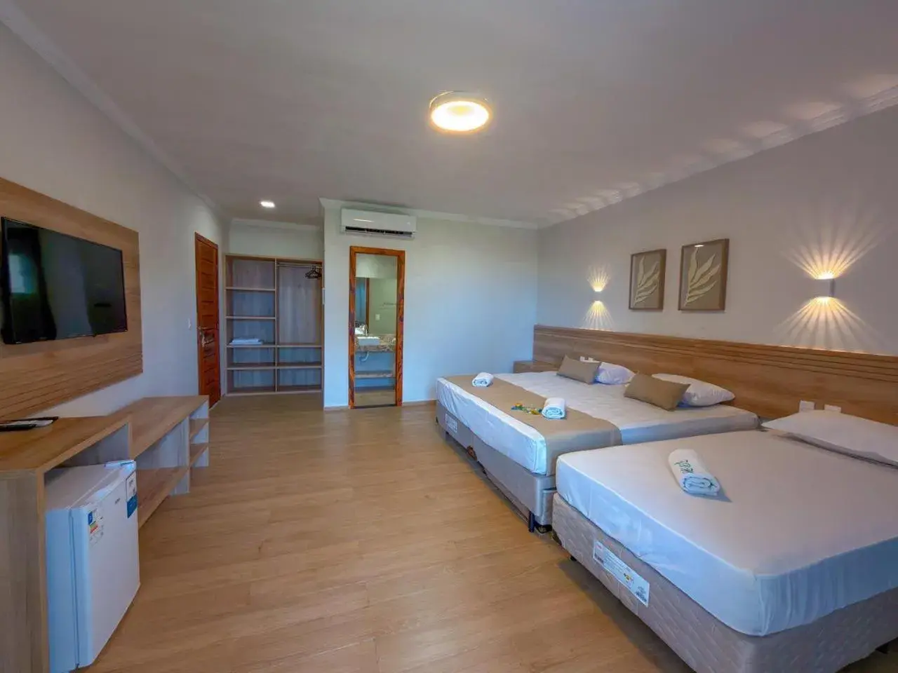 Deluxe Triple Room with Sea View in Jangadeiro Praia Hotel Resort - Parque Aquático e Pé na Areia Deluxe Triple Room with Sea View in Jangadeiro Praia Hotel Resort - Parque Aquático e Pé na Areia