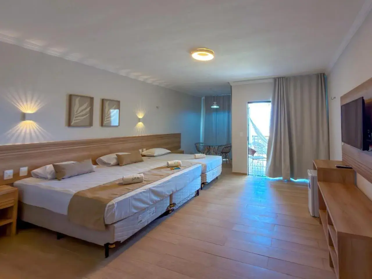 Deluxe Triple Room with Sea View in Jangadeiro Praia Hotel Resort - Parque Aquático e Pé na Areia Deluxe Triple Room with Sea View in Jangadeiro Praia Hotel Resort - Parque Aquático e Pé na Areia