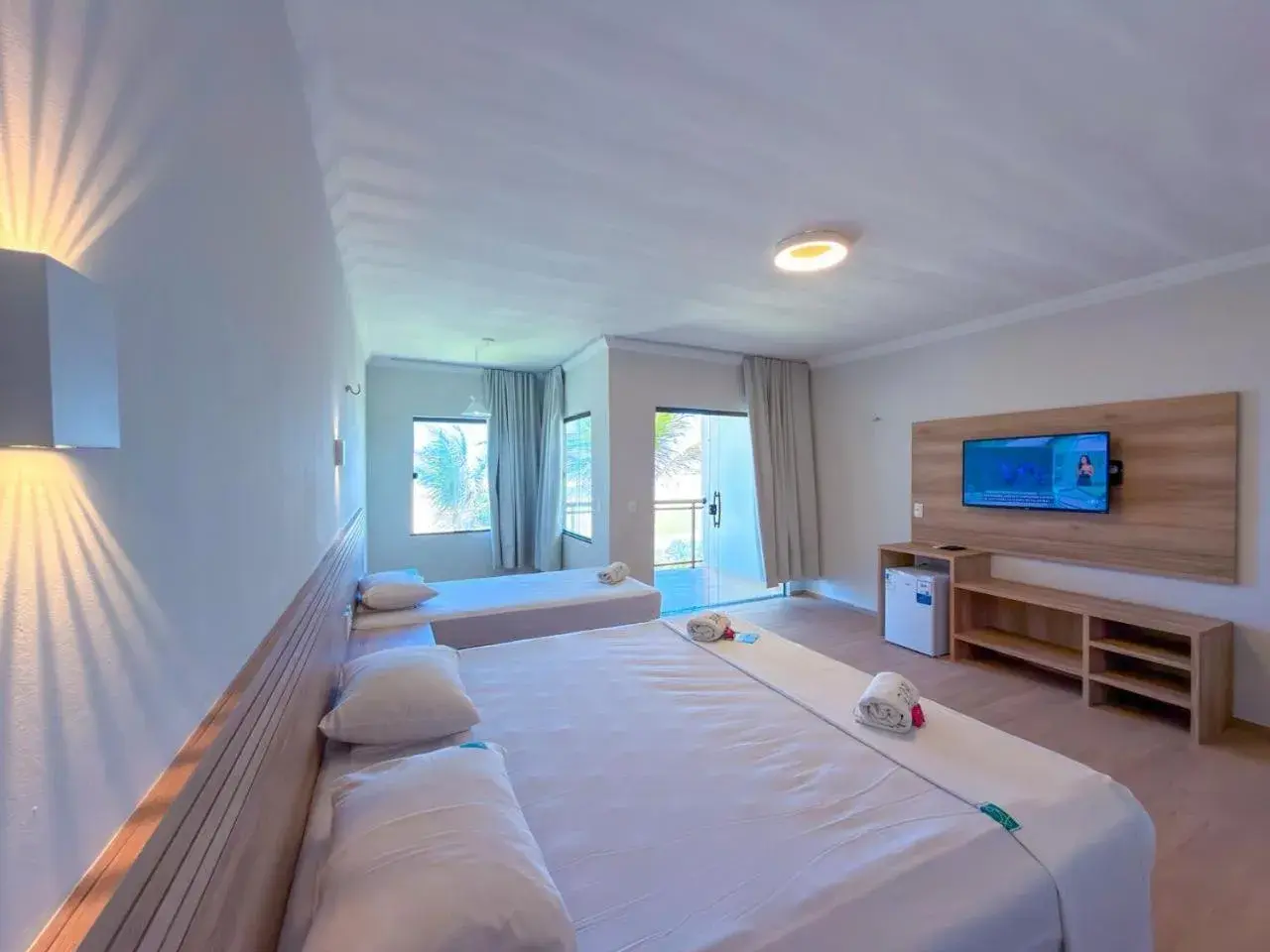 Deluxe Triple Room with Sea View in Jangadeiro Praia Hotel Resort - Parque Aquático e Pé na Areia Deluxe Triple Room with Sea View in Jangadeiro Praia Hotel Resort - Parque Aquático e Pé na Areia