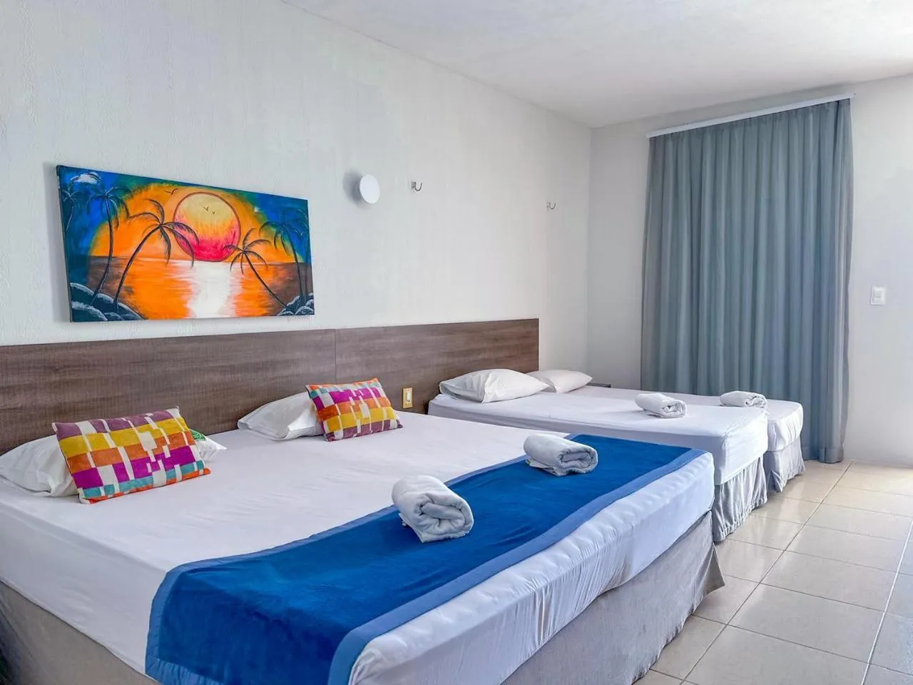 Photo of the whole room, Bed in Jangadeiro Praia Hotel Resort - Parque Aquático e Pé na Areia