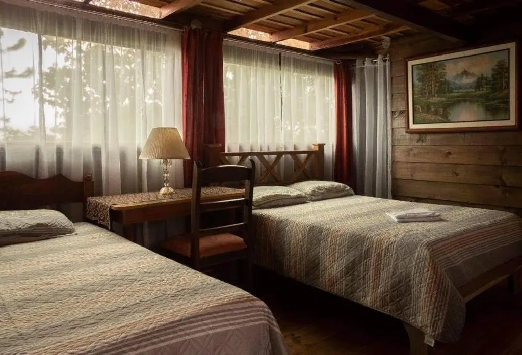 Bed in Vista Turrialba Lodge