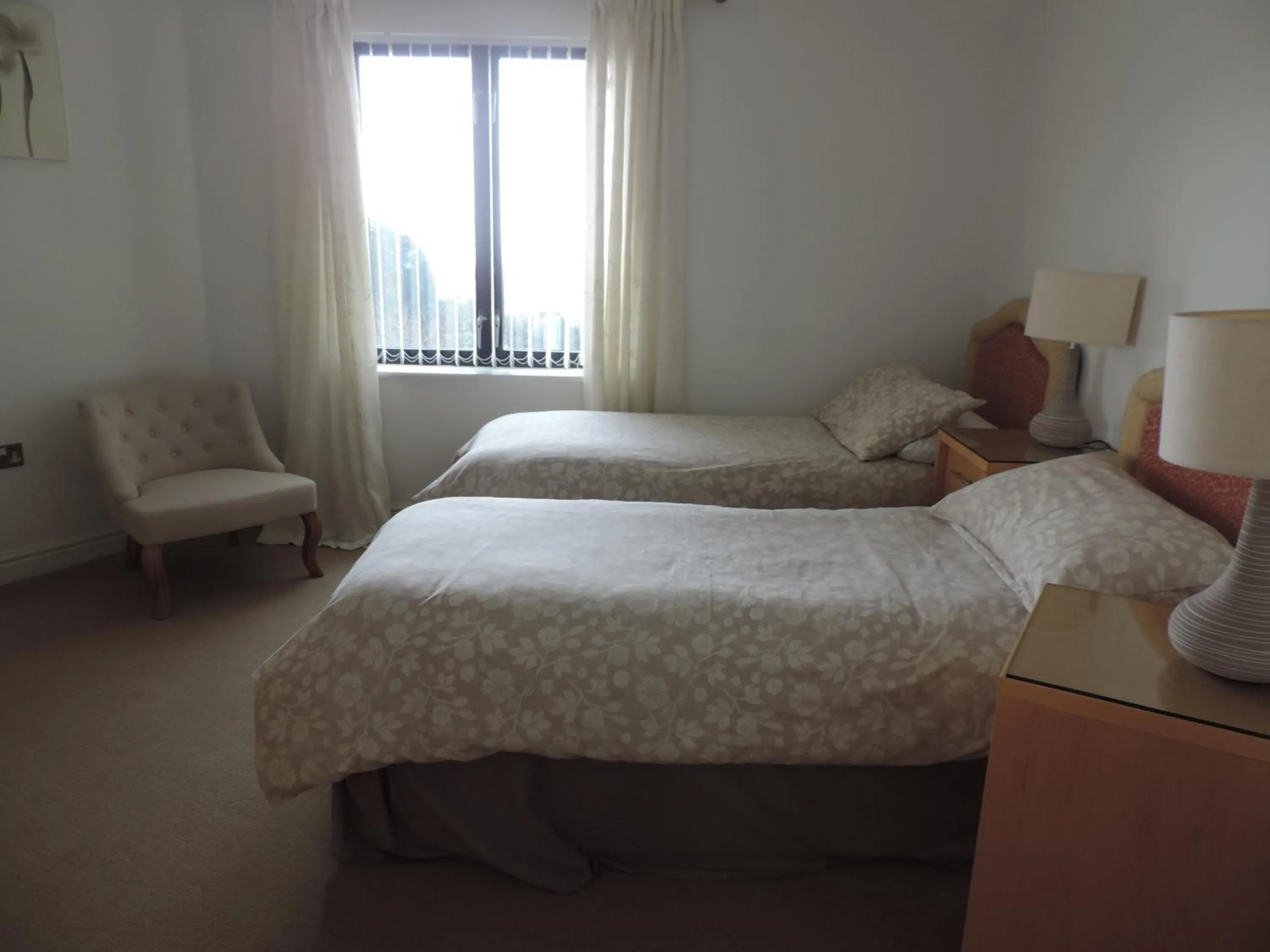 Bed in Sea Breeze Apartment