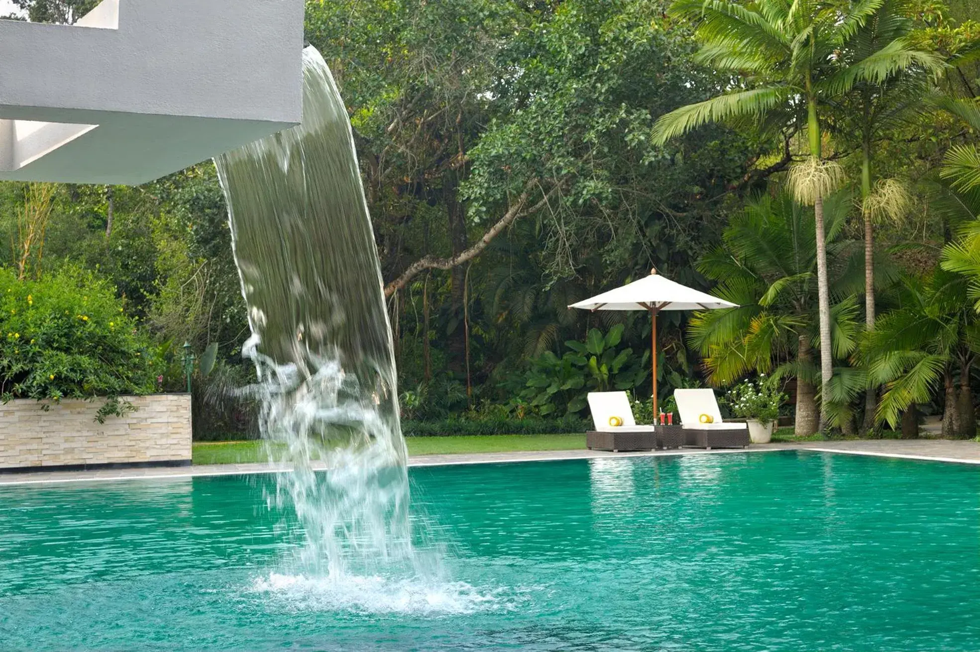Swimming pool in Amanvana Spa Resort, Coorg Swimming pool in Amanvana Spa Resort, Coorg