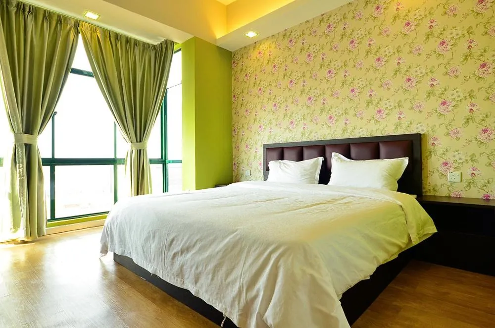 Bed in Jetty Suites Apartments