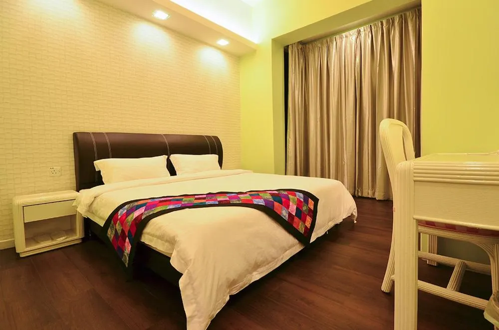 Bed in Jetty Suites Apartments