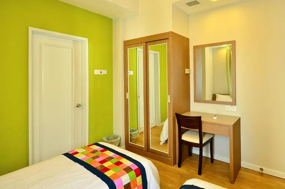 Bed in Jetty Suites Apartments