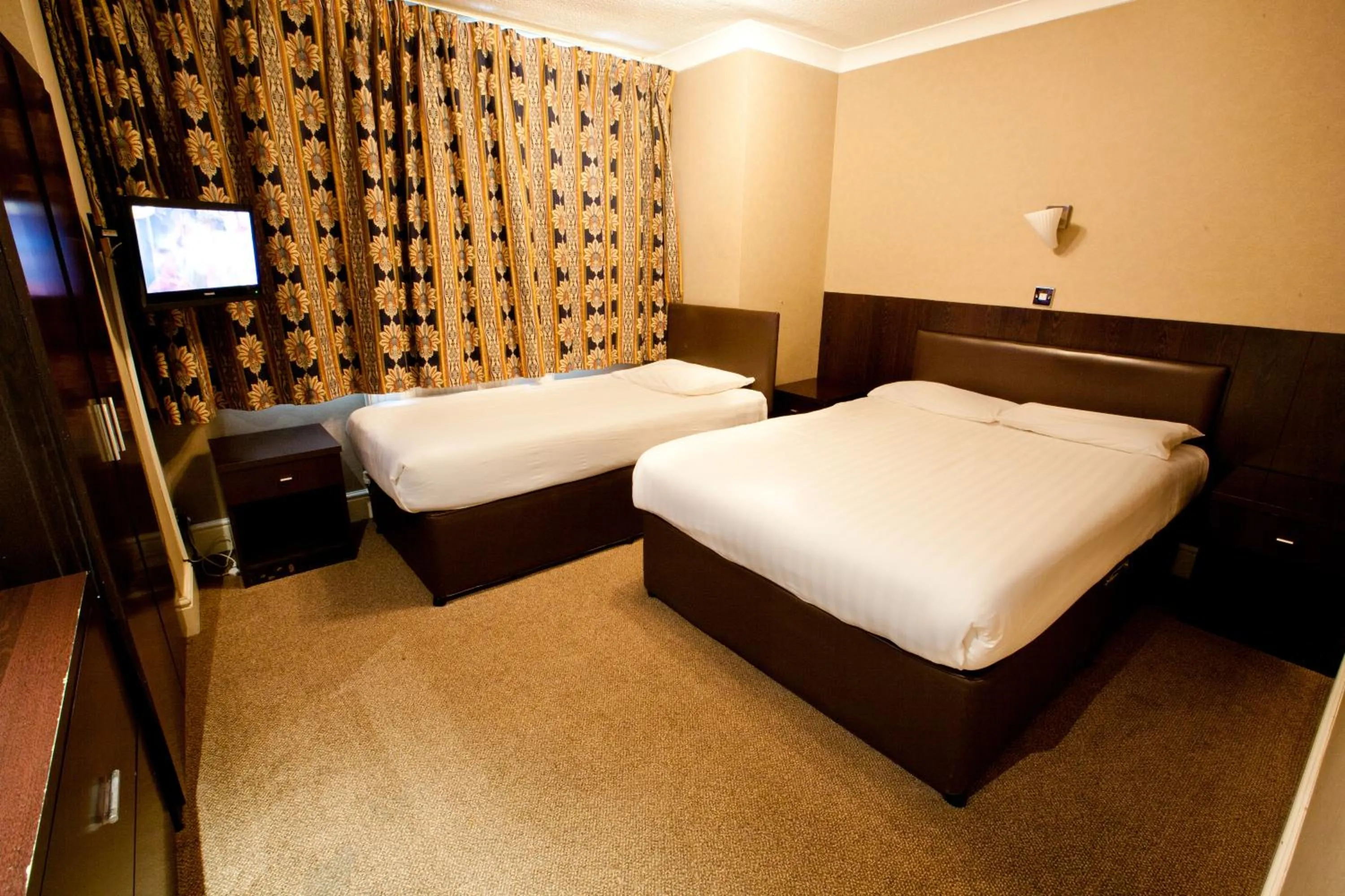 Bed in Rossmore Hotel