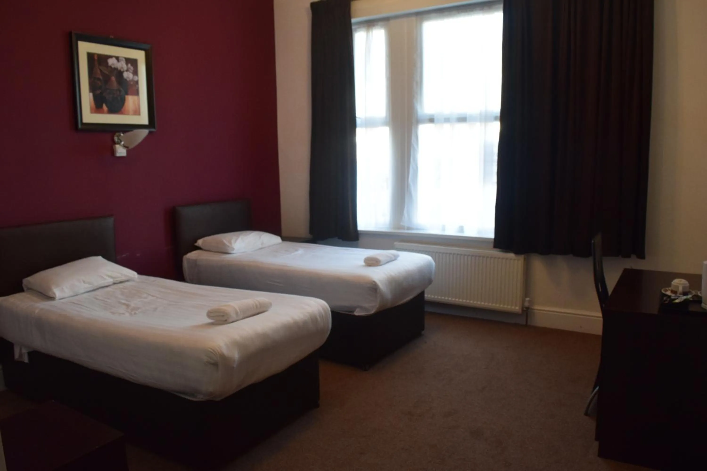 Toilet in Rossmore Hotel