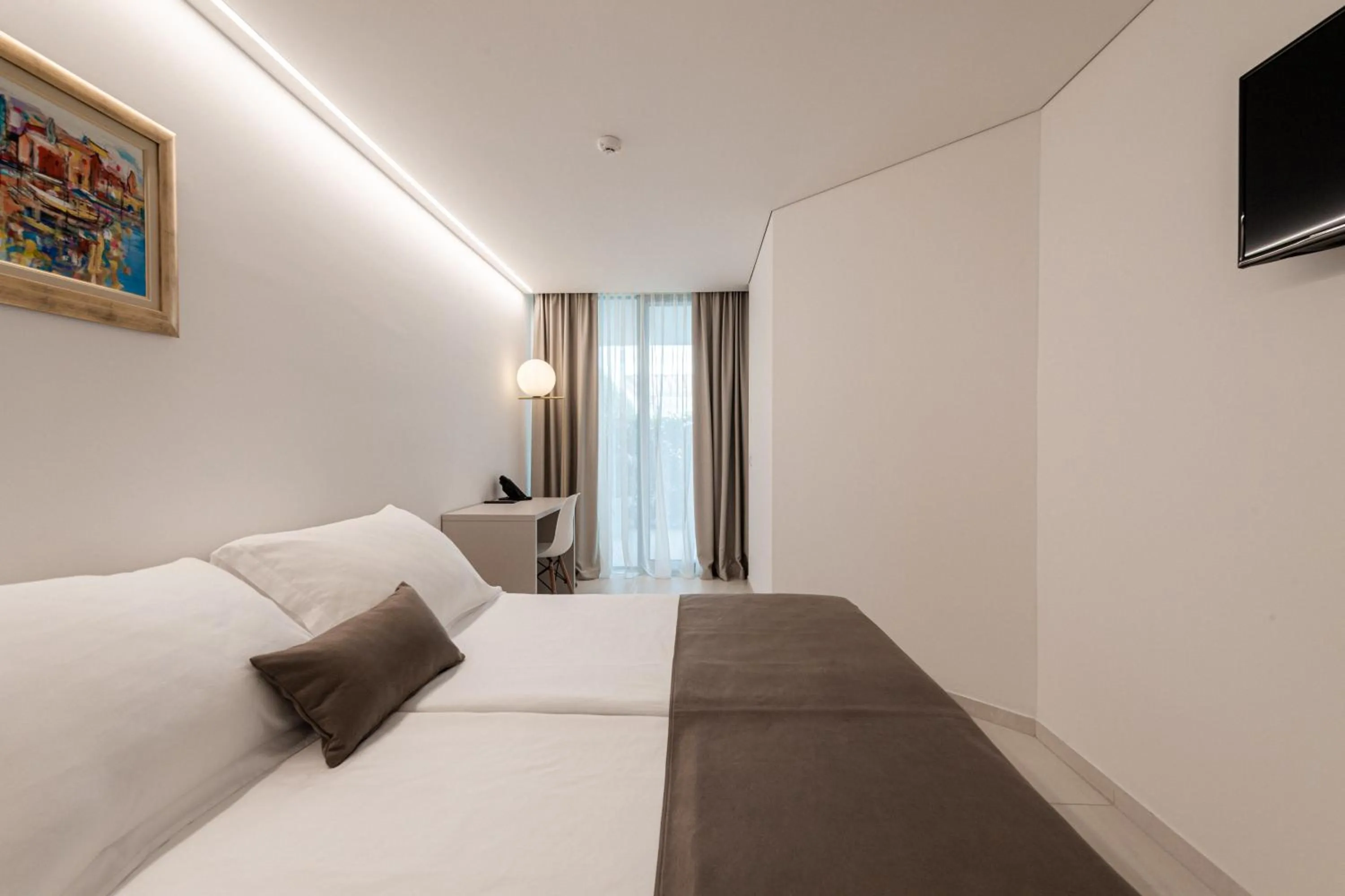 Bed in Aparthotel Joel