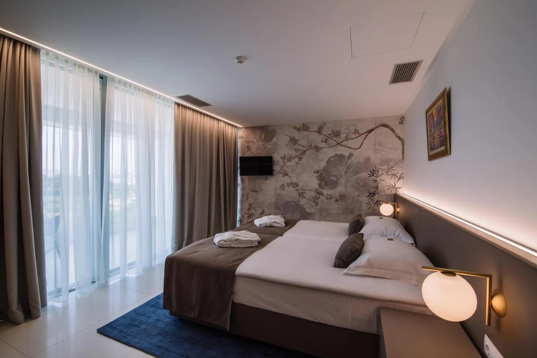 Bed in Aparthotel Joel