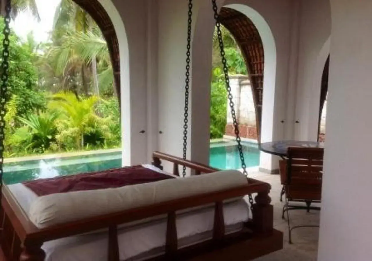 Patio, Bed in Taj Bekal Resort & Spa, Kerala Patio, Bed in Taj Bekal Resort & Spa, Kerala