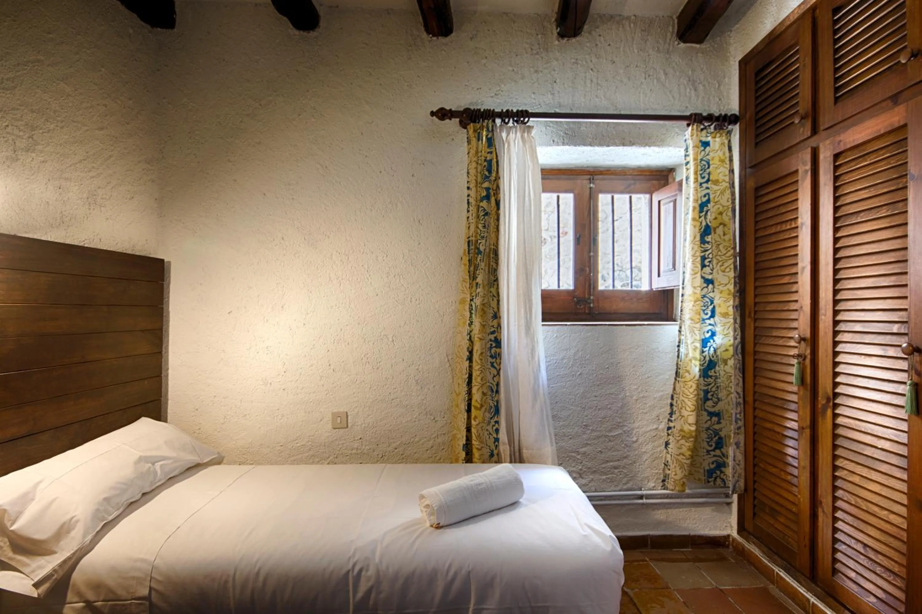 Bed in Masia Can Pou