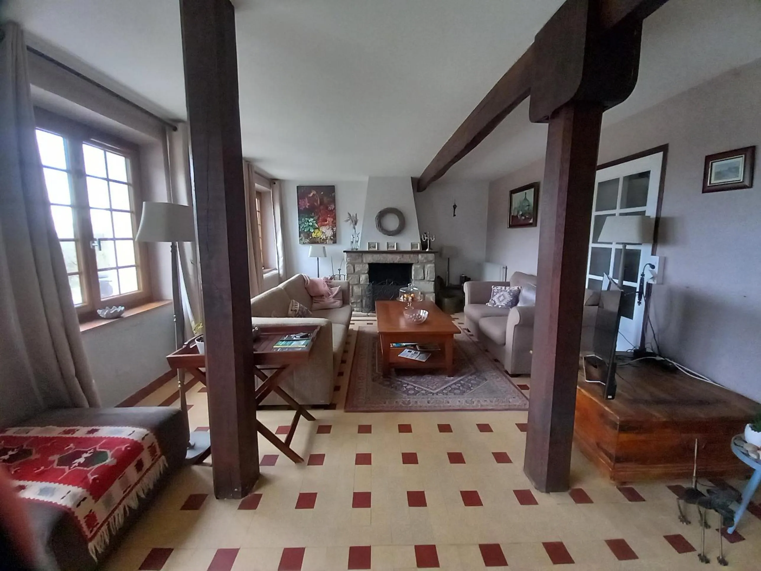 Communal lounge/ TV room in Chambre d'hôtes Le Puy Maury