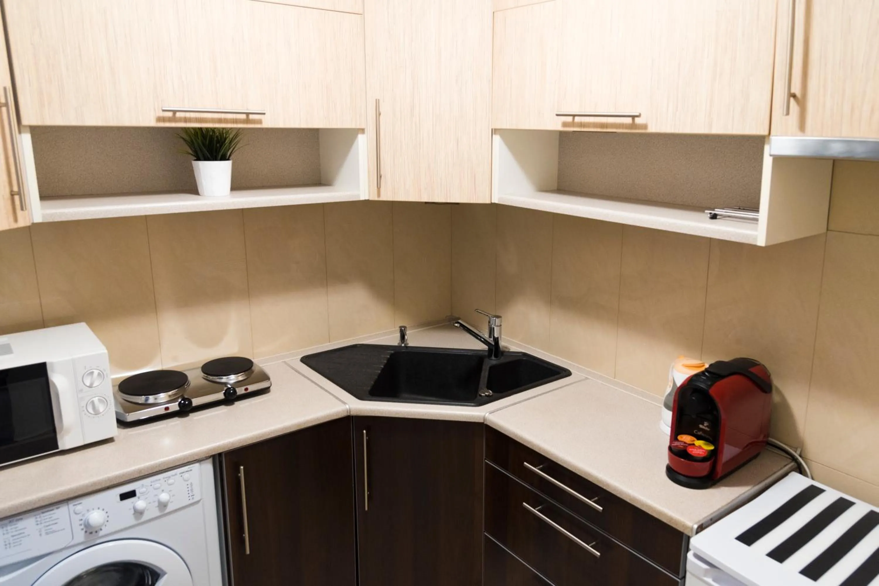 Coffee/tea facilities in Hosapartments City Center