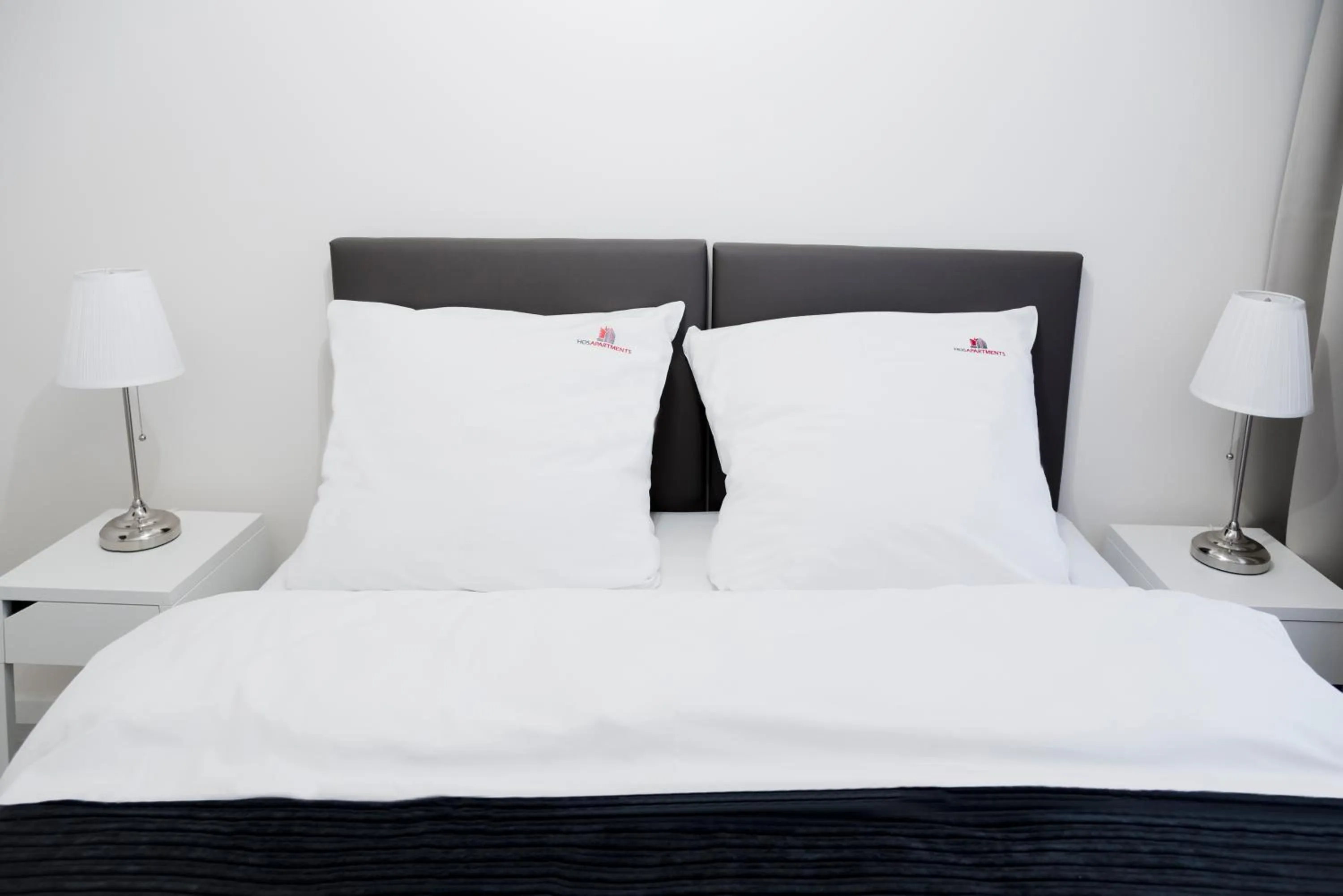 Photo of the whole room, Bed in Hosapartments City Center