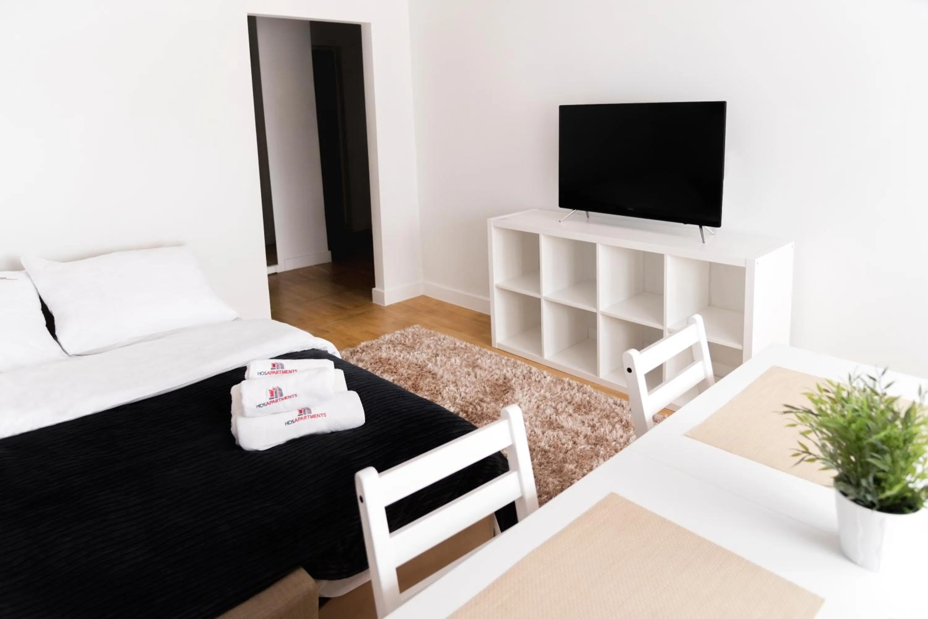 Living room, Bed in Hosapartments City Center