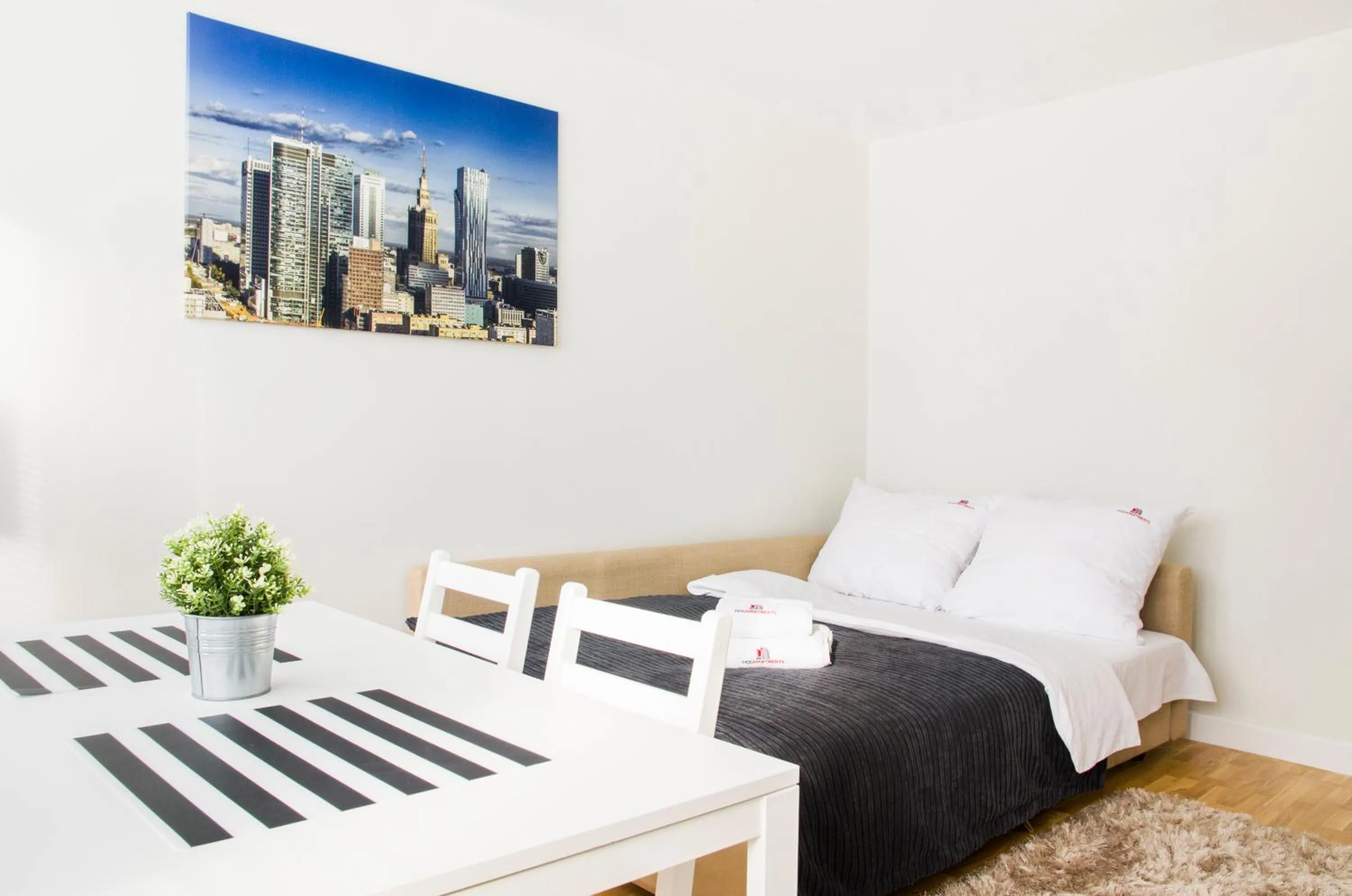 Living room, Bed in Hosapartments City Center