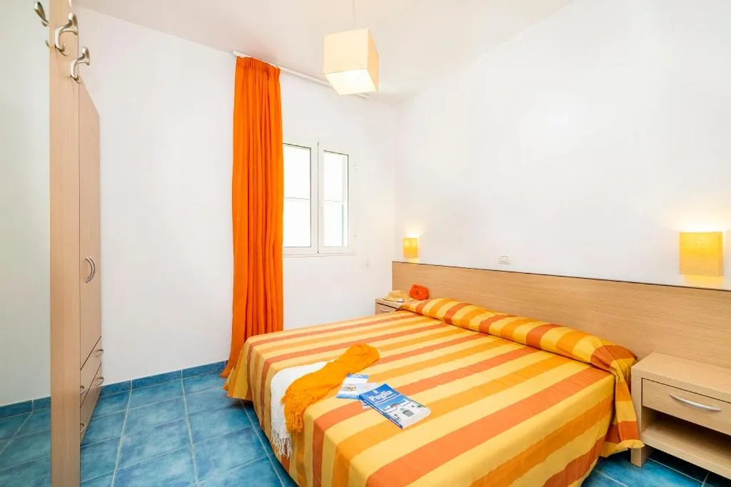 Bedroom, Bed in Baia Degli Aranci Suite & Apartments