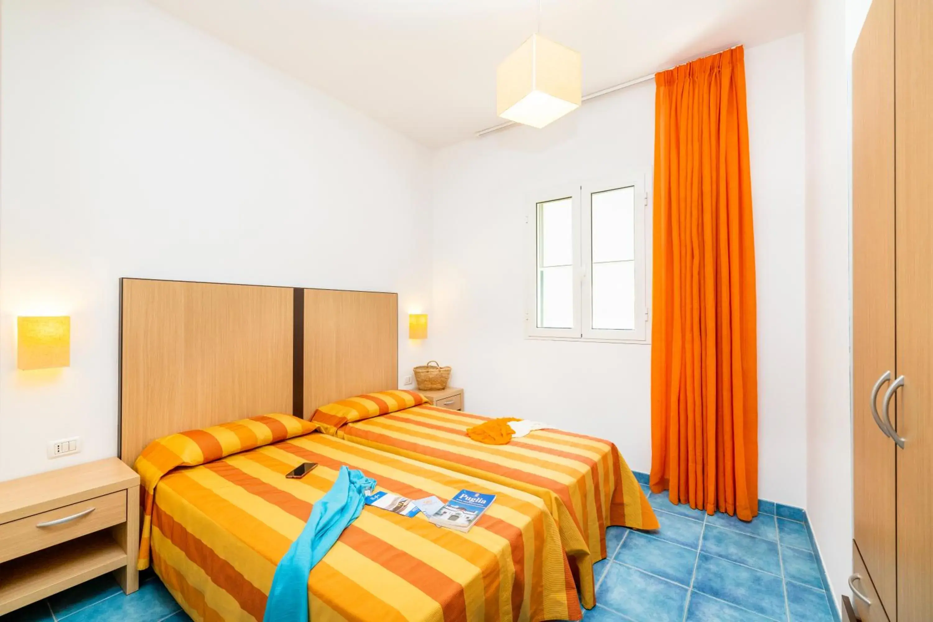 Bedroom in Baia Degli Aranci Suite & Apartments Bedroom in Baia Degli Aranci Suite & Apartments