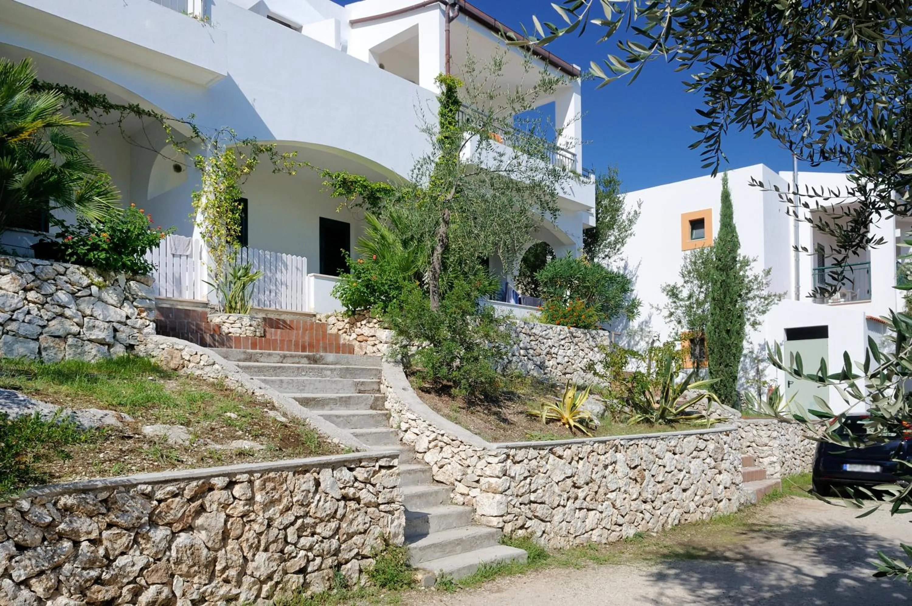 Property building in Baia Degli Aranci Suite & Apartments