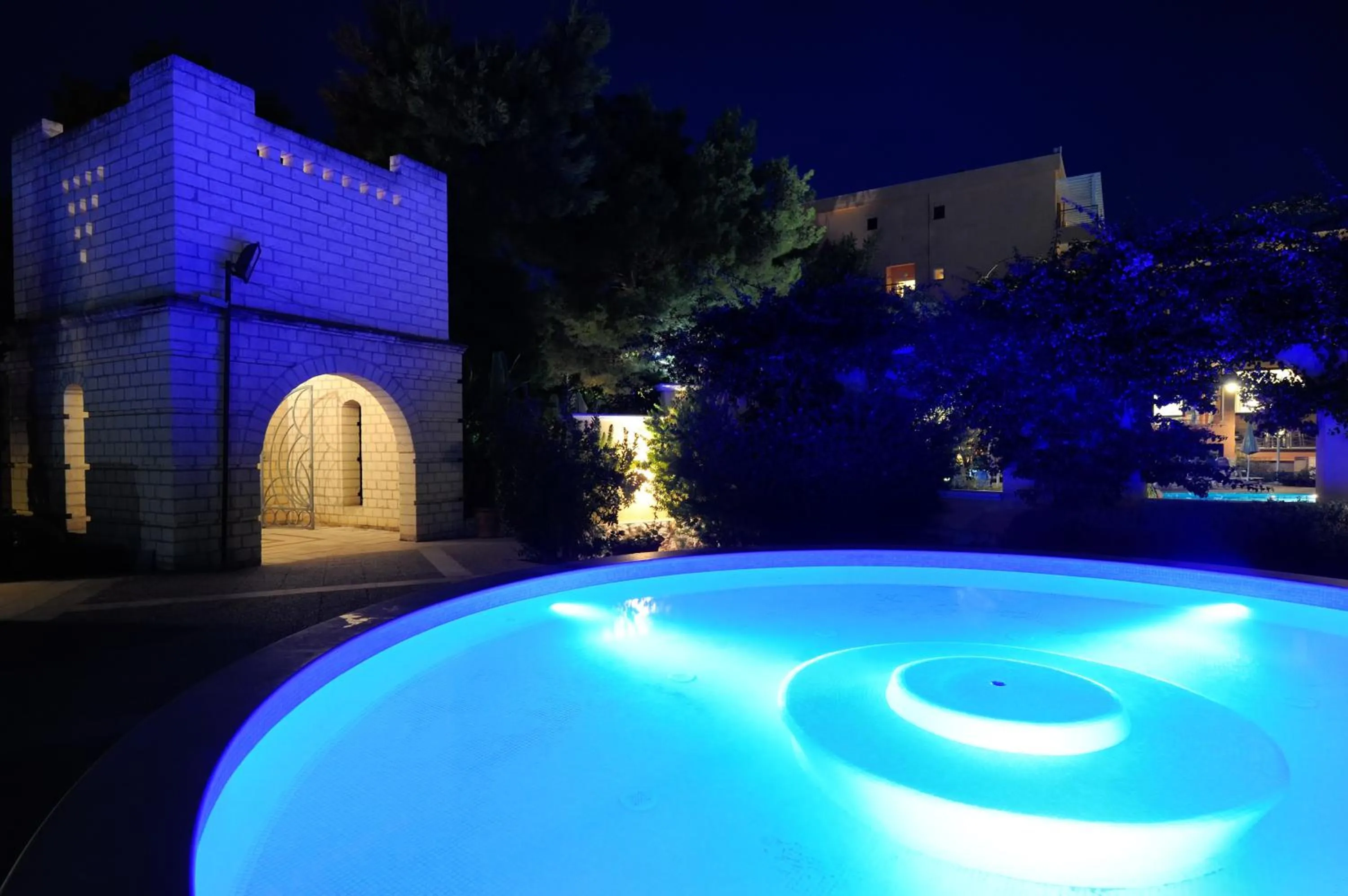 Swimming pool in Baia Degli Aranci Suite & Apartments