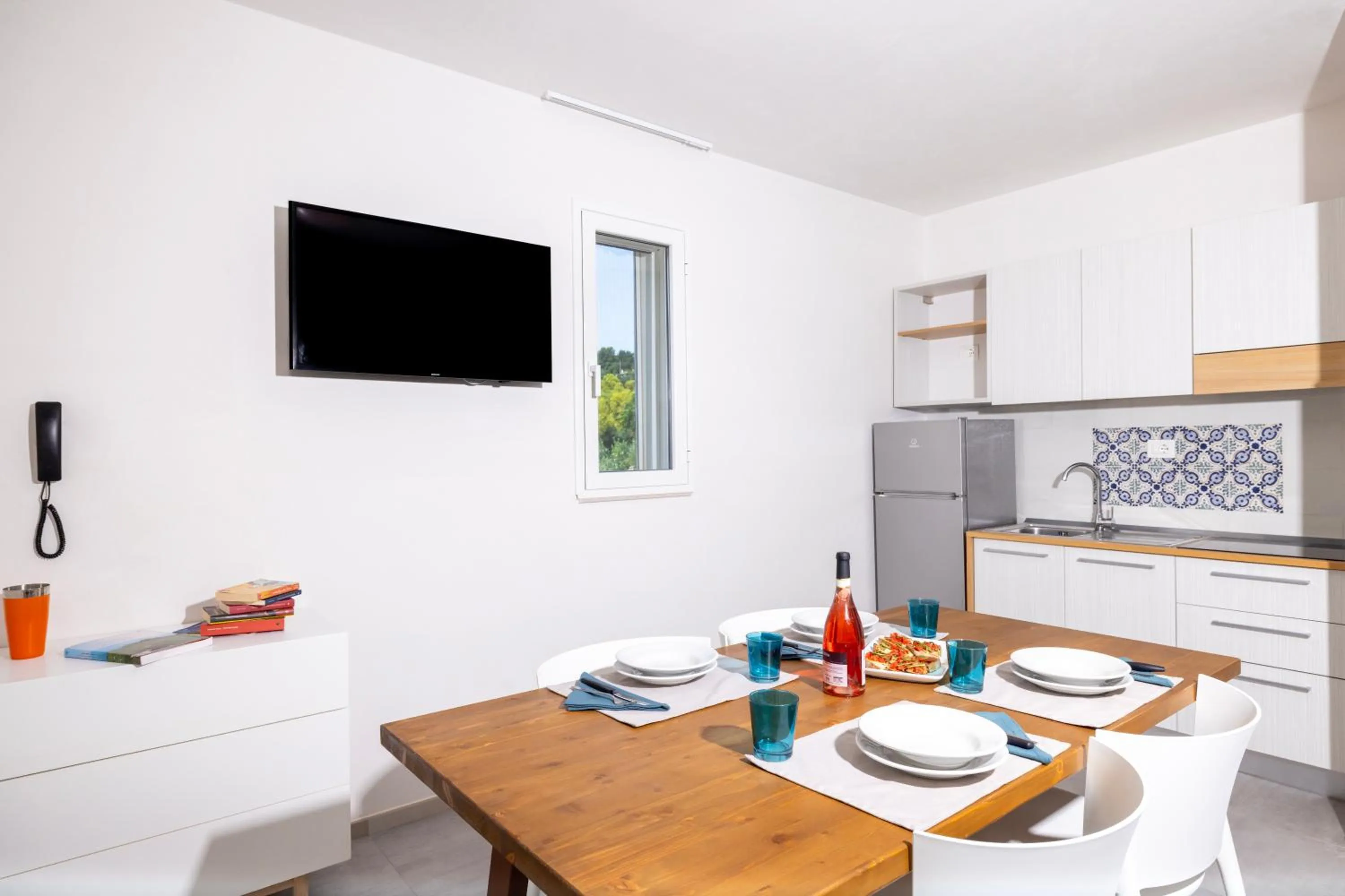 Kitchen or kitchenette in Baia Degli Aranci Suite & Apartments