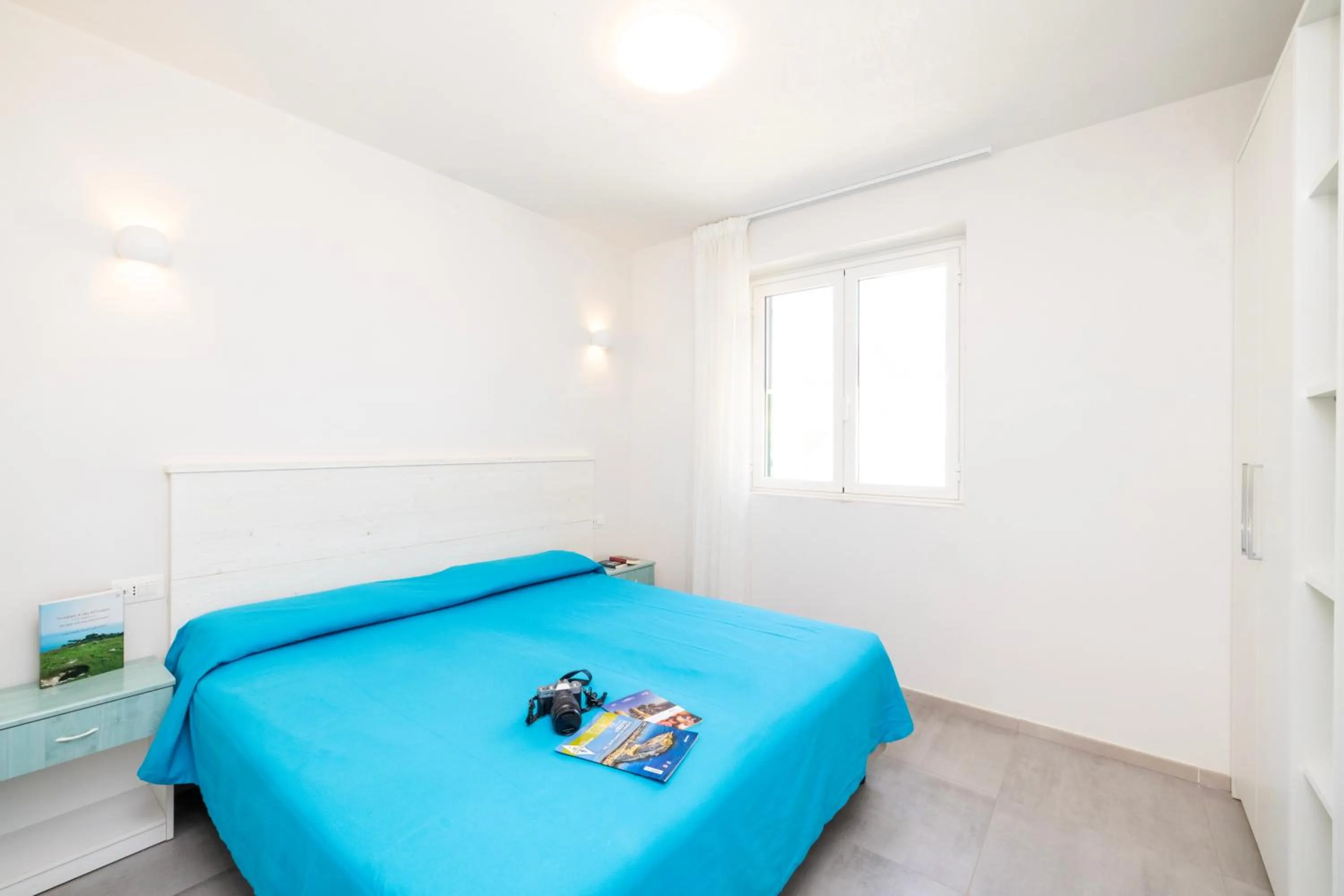 Bedroom in Baia Degli Aranci Suite & Apartments