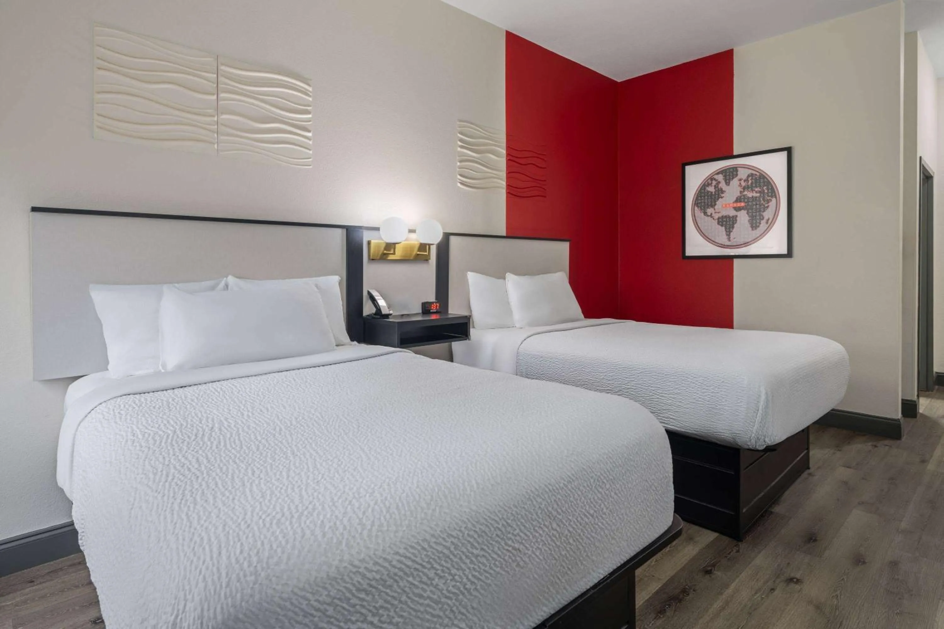 Photo of the whole room, Bed in Ramada by Wyndham Locust Grove