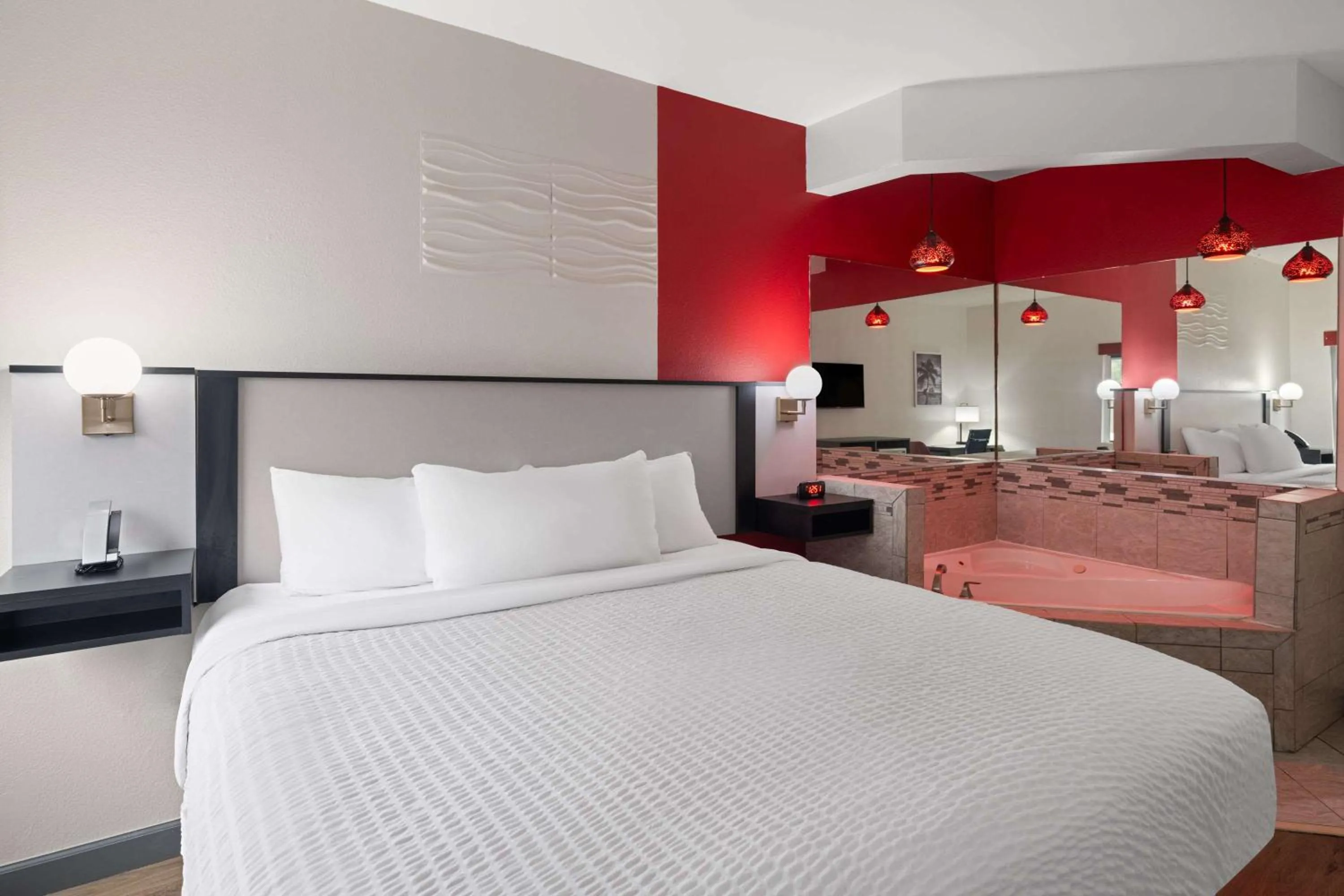 Photo of the whole room, Bed in Ramada by Wyndham Locust Grove