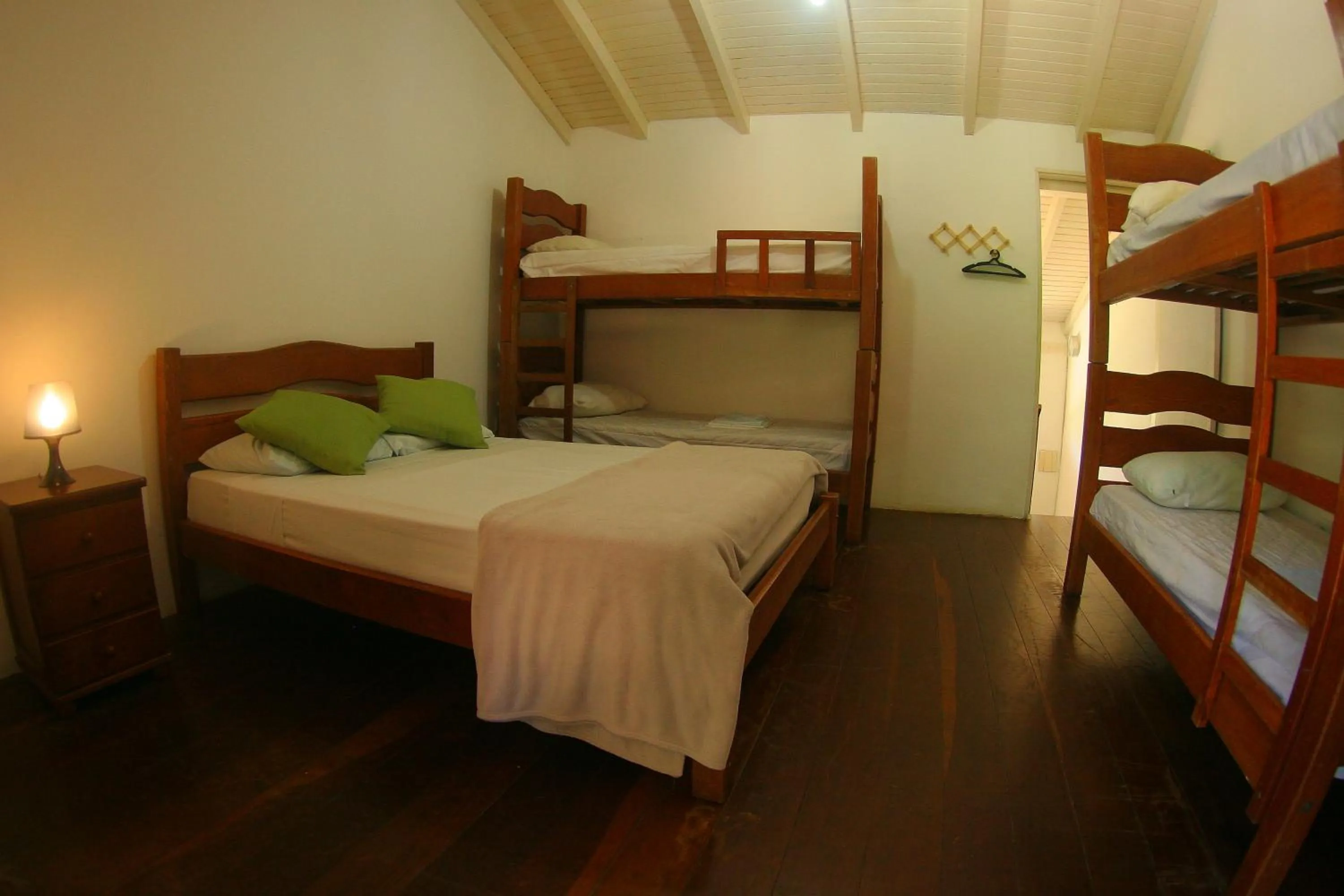 Photo of the whole room, Bed in Pousada Tubes Maresias