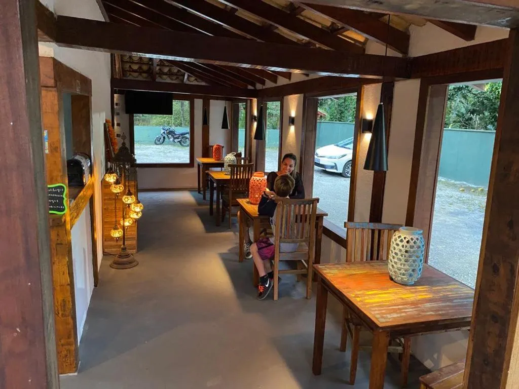 Lobby or reception in Pousada Tubes Maresias