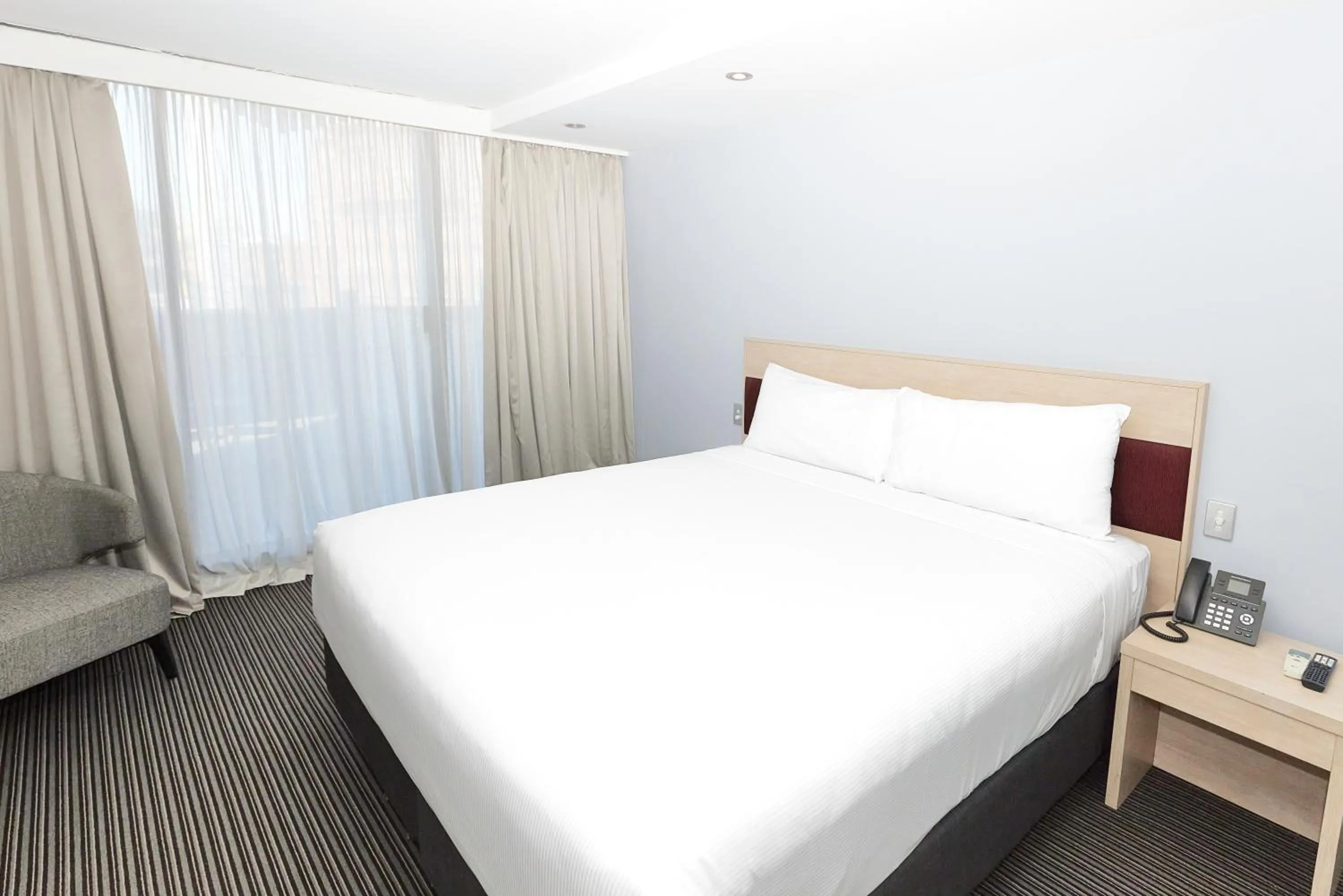 Bed in Central Studio Hotel Sydney