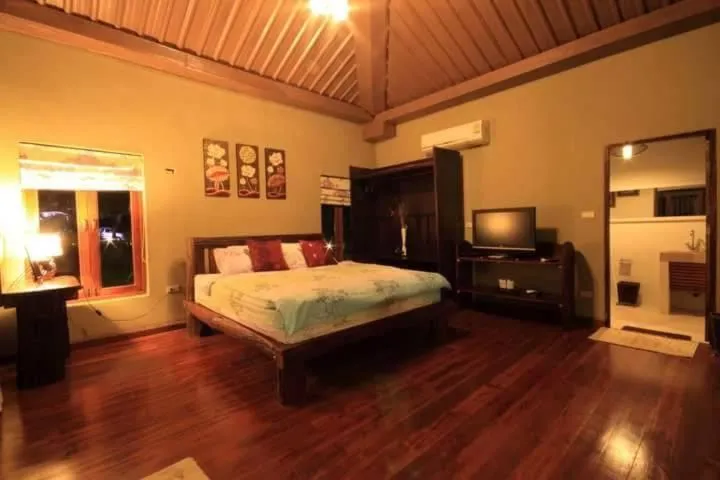 Bed in Chez Piera Resort