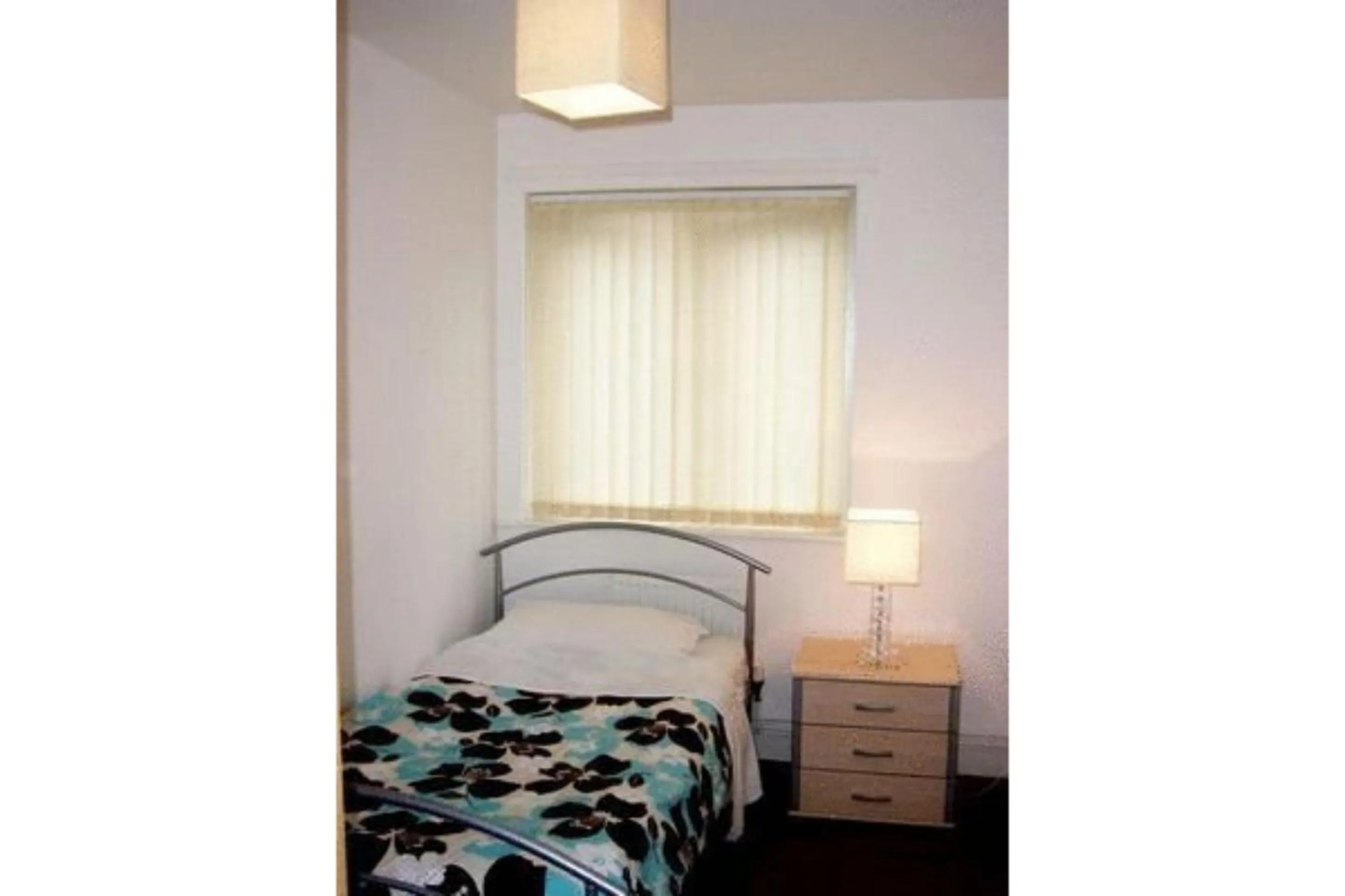 Bedroom in OYO Arinza Apartments