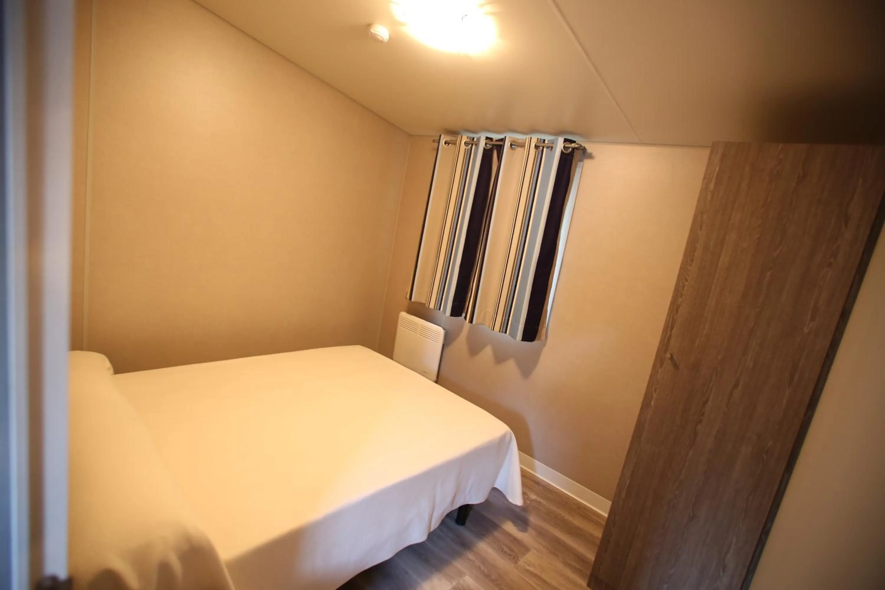 Bed in Bungalows y Mobil Homes Camping Regio