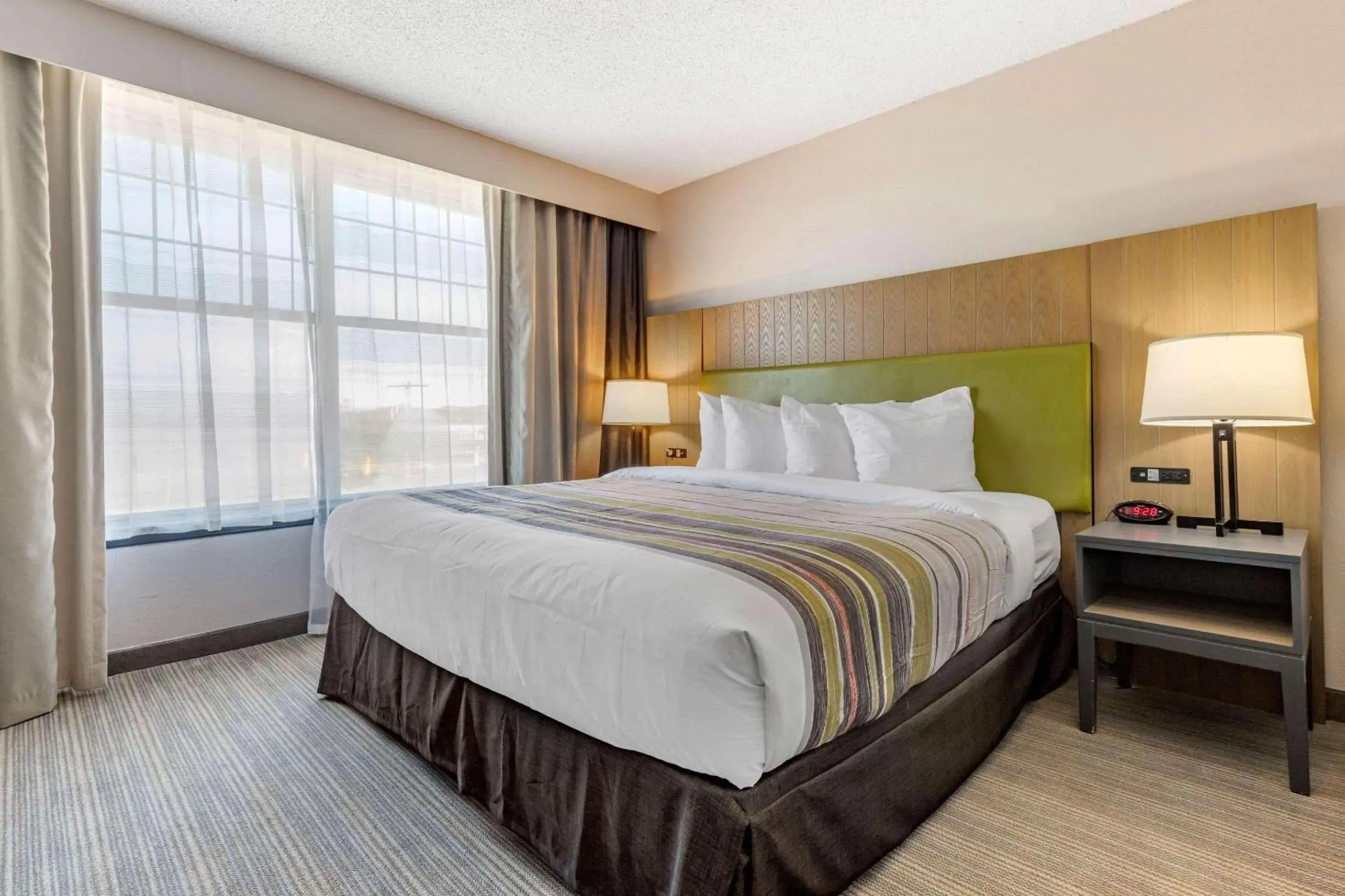 Bedroom, Bed in Country Inn & Suites by Radisson, Lumberton, NC Bedroom, Bed in Country Inn & Suites by Radisson, Lumberton, NC