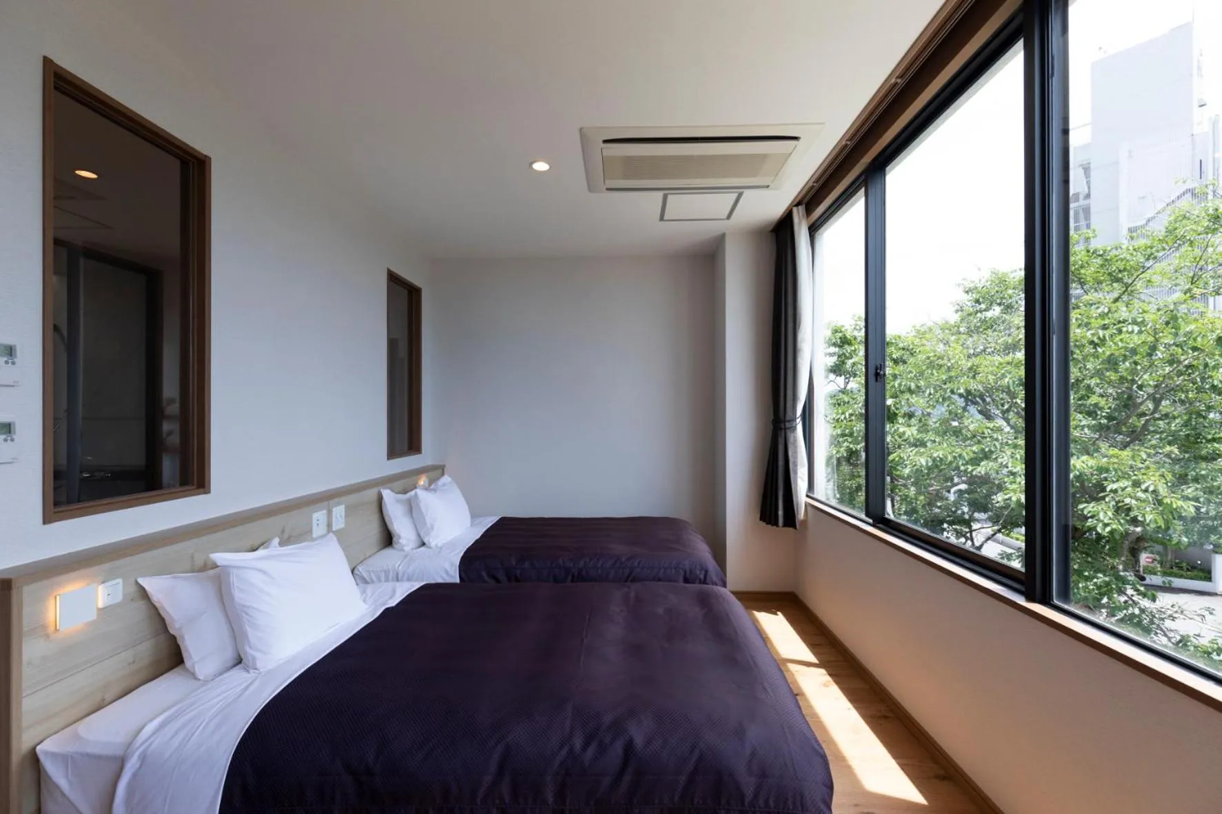Bed in 宮島離れの宿 IBUKU -Miyajima Hanare no Yado IBUKU-