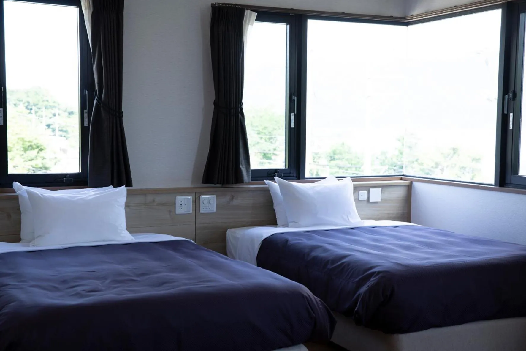 Bed in 宮島離れの宿 IBUKU -Miyajima Hanare no Yado IBUKU-