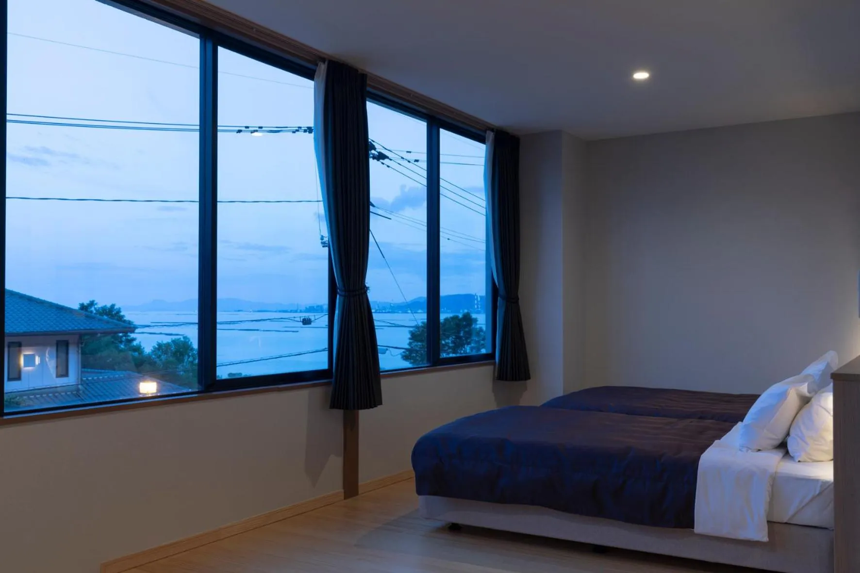 Bed in 宮島離れの宿 IBUKU -Miyajima Hanare no Yado IBUKU-