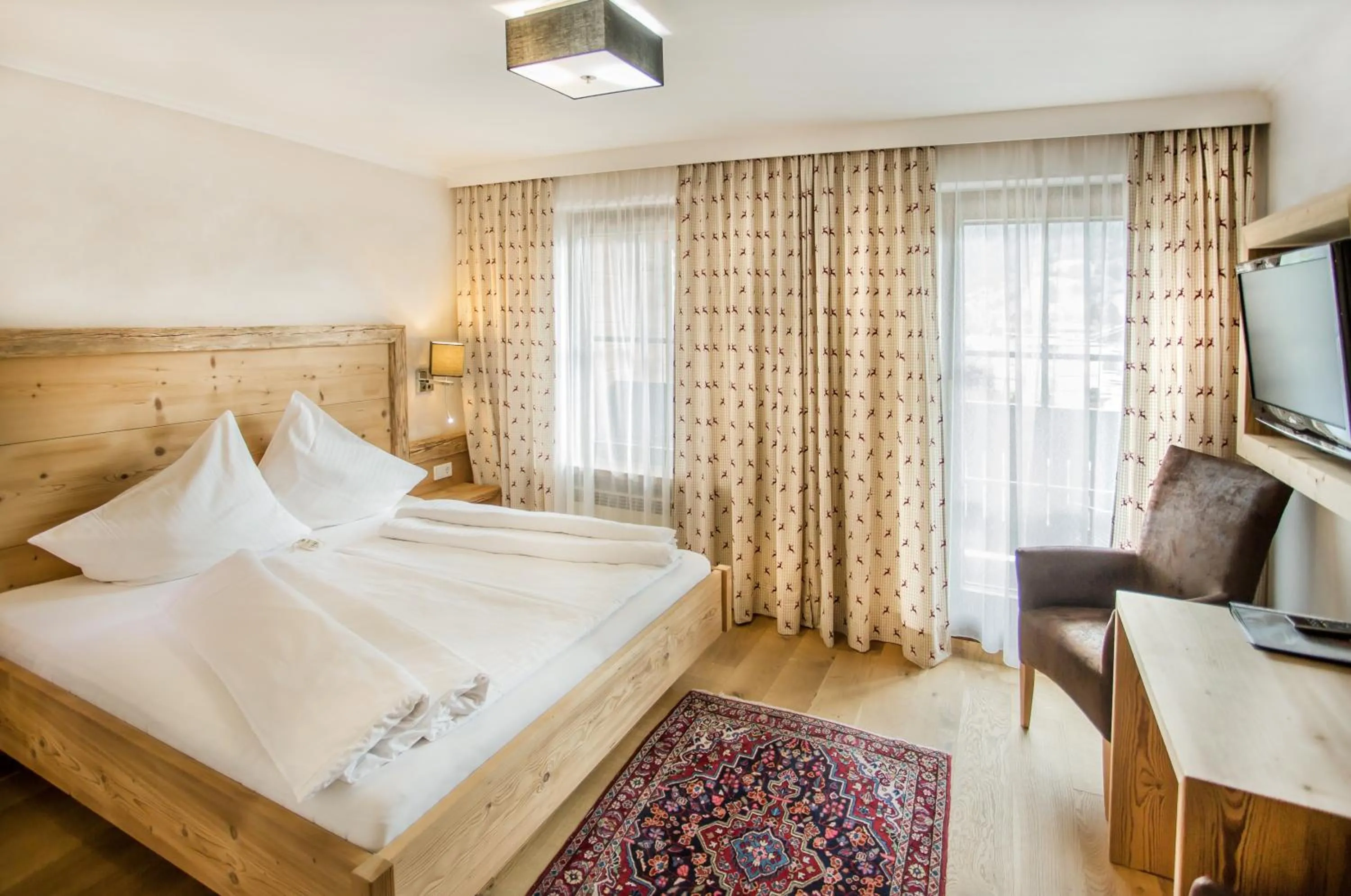Photo of the whole room, Bed in Familien- und Vitalhotel Mühlpointhof