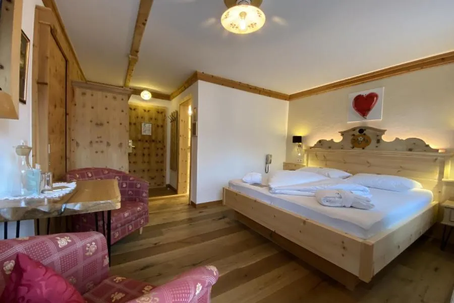 Photo of the whole room, Bed in Familien- und Vitalhotel Mühlpointhof