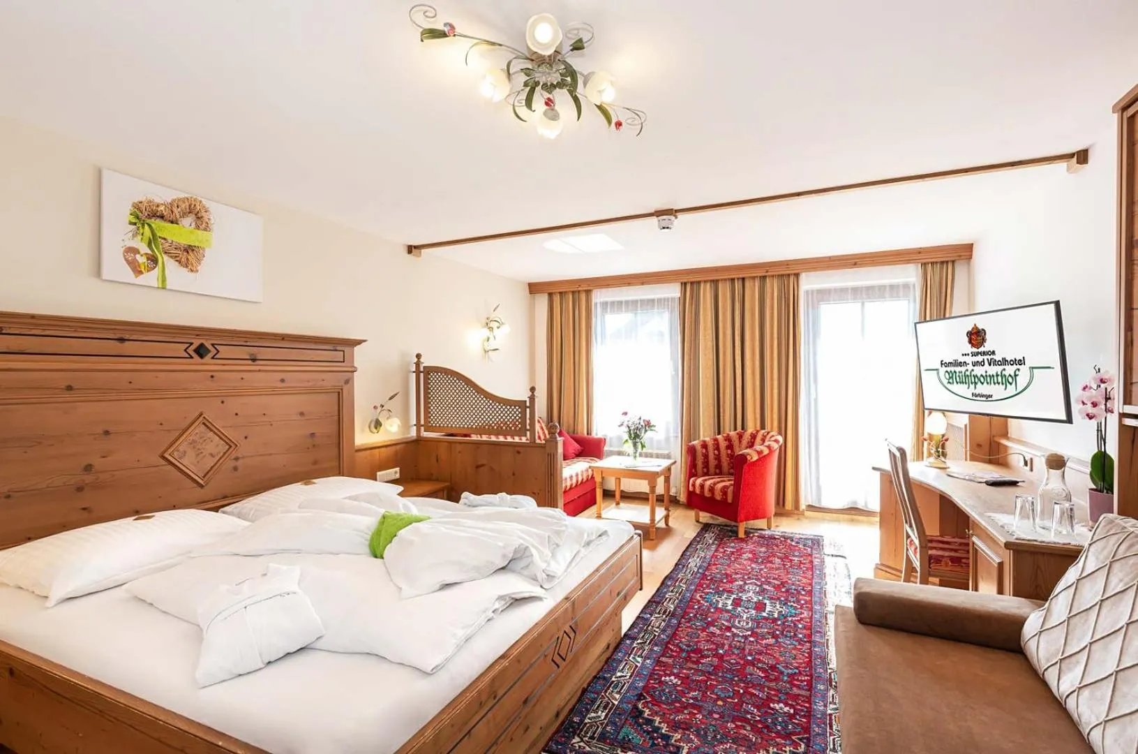 Photo of the whole room, Bed in Familien- und Vitalhotel Mühlpointhof