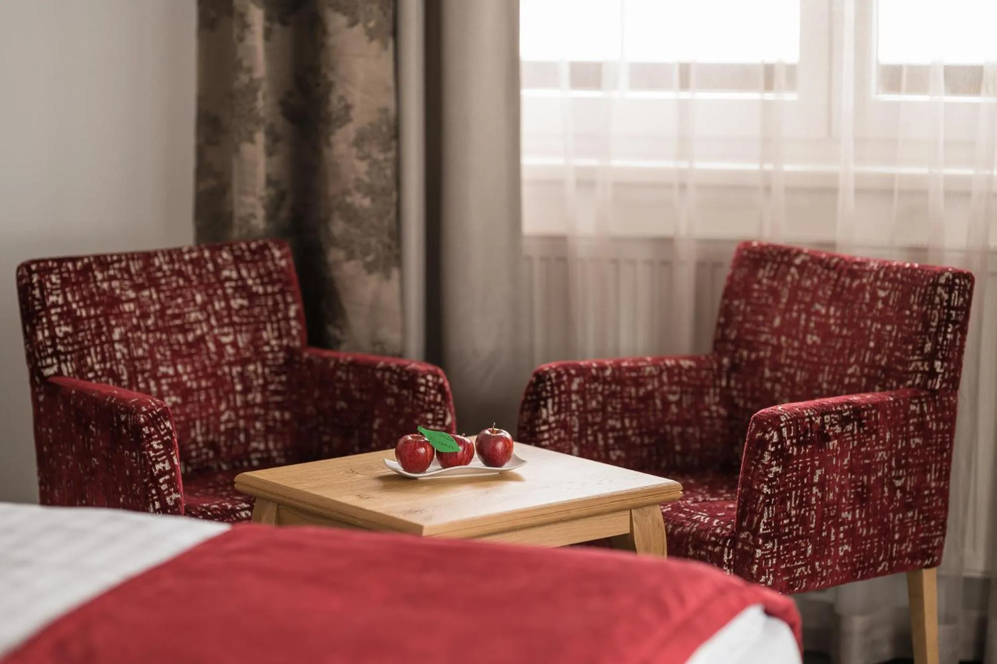 Seating area, Bed in Hotel Seespitz