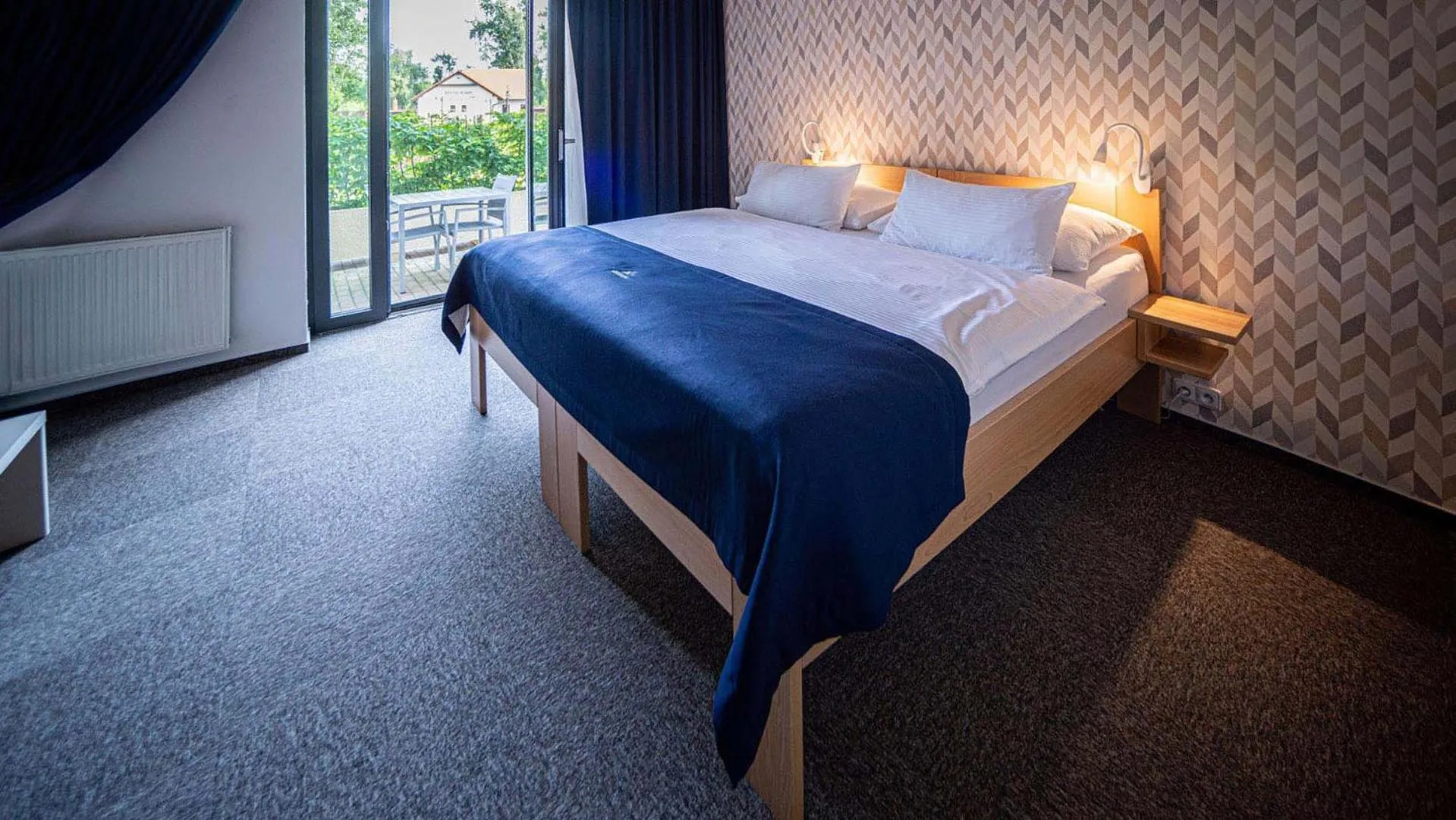 Bed in HOTEL Hraniční zámeček