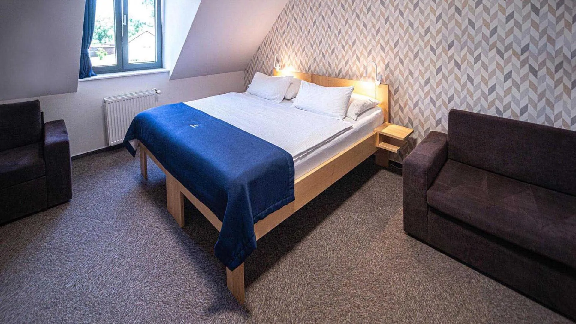 Bed in HOTEL Hraniční zámeček